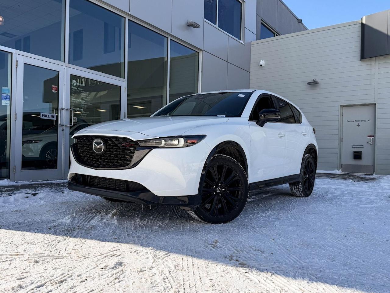 Discover the perfect blend of performance, luxury, and advanced technology with this pre-owned 2022 Mazda CX-5 Sport Design w/Turbo AWD in sleek Black. Powered by a 2.5L SKYACTIV-G turbocharged engine paired with a smooth 6-speed automatic transmission and full-time AWD, this SUV delivers responsive handling and confident driving in all conditions.Step inside to find premium leather upholstery with heated and ventilated front seats, dual-zone automatic climate control, and a suite of cutting-edge safety features including lane departure prevention, blind spot monitoring, and forward collision mitigation. Your drive is enhanced by the Bose premium sound system, a 10.2-inch touchscreen with navigation, and smartphone mirroring with wireless charging for seamless connectivity.Sporty 19 Black Metallic alloy wheels, LED adaptive headlights, and tasteful black exterior accents give this CX-5 a bold and modern look. Practical touches like a power liftgate, rearview camera, and ample cargo space complete this SUVs appeal.Ready to elevate your daily drive with style, comfort, and capability? Contact us today to schedule your test drive of this exceptional 2022 Mazda CX-5 Sport Design w/Turbo AWD!Go Mazda is an AMVIC licensed business.This vehicle has been registered in the province ofQuébec