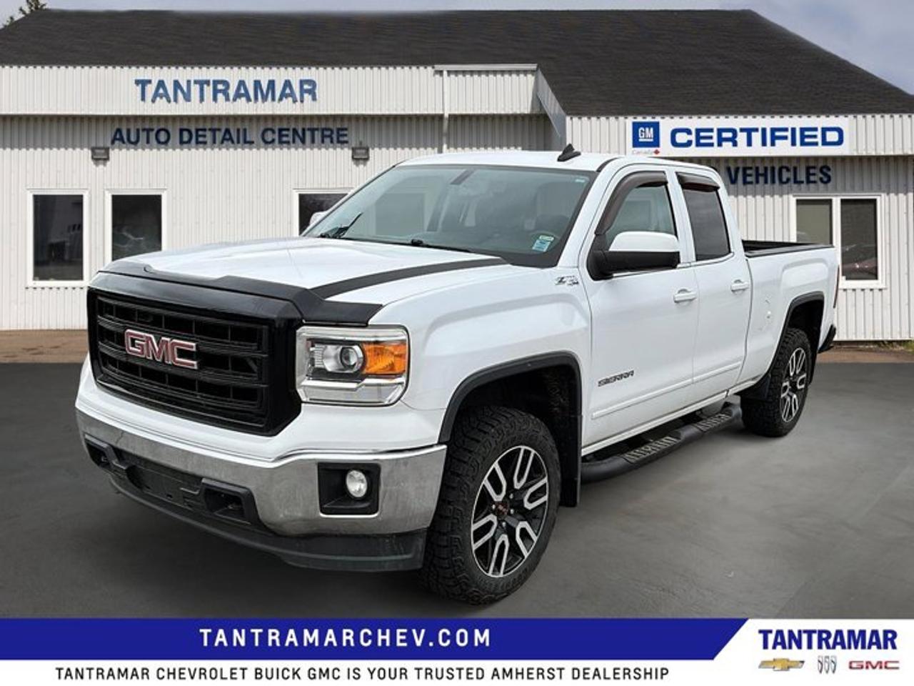 This 2015 GMC Sierra SLE 4x4 with 113,002 km has been prepared with a new MVI, fresh oil change, and completed brake inspection, confirming it has passed inspection without the need for corrective repairs. Equipped with a 5.3L V8 paired to a 6-speed transmission, this Sierra offers proven durability and straightforward capability in a full-size truck platform. The double cab configuration with a 6.6 ft box provides a practical balance of passenger space and cargo utility, while features such as a factory trailer package, and aluminum wheels support both daily driving comfort and towing functionality. Finished in white with a black interior, this SLE trim represents a well-equipped, work-ready option for buyers seeking a reliable 4x4 pickup. Contact us to arrange a viewing and test drive to determine if this Sierra meets your needs.