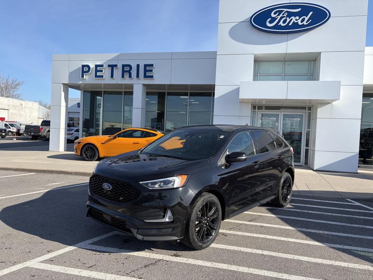 Go further! Here is a 2022 Ford Edge ST. Powered by a 2.7L GTDI V6 engine with a 7-speed automatic transmission that delivers impressive performance and smooth handling. The 2022 Ford Edge ST is a performance vehicle that features comfortable seating, modern tech features and prioritizes safety. No reported accidents and only one previous owner! Adventure is calling, come check out the 2022 Ford Edge ST today! Key Features: >> Equipment group 401A >> Cold weather package >> Remote vehicle start >> Universal garage door opener >> Rear parking sensors >> Rear privacy glass >> Wireless charging pad >> 12V front and rear powerpoints >> Trailer tow package class III >> Heated steering wheel >> Panoramic roof >> Tire pressure monitoring system >> B&O audio system >> Reverse camera system >> FORDPASS CONNECT and so much more! *This vehicle was originally registered in Quebec* This 2022 Ford Edge ST is available now at Petrie Ford. We are located at 1388 Bath Road in Kingston, Ontario. Come schedule a test drive today!<p>Go further! Here is a 2022 Ford Edge ST. Powered by a 2.7L GTDI V6 engine with a 7-speed automatic transmission that delivers impressive performance and smooth handling. The 2022 Ford Edge ST is a performance vehicle that features comfortable seating</p>
<p> modern tech features and prioritizes safety. No reported accidents and only one previous owner! Adventure is calling</p>
<p> come check out the 2022 Ford Edge ST today! Key Features: >> Equipment group 401A >> Cold weather package >> Remote vehicle start >> Universal garage door opener >> Rear parking sensors >> Rear privacy glass >> Wireless charging pad >> 12V front and rear powerpoints >> Trailer tow package class III >> Heated steering wheel >> Panoramic roof >> Tire pressure monitoring system >> B&O audio system >> Reverse camera system >> FORDPASS CONNECT and so much more! *This vehicle was originally registered in Quebec* This 2022 Ford Edge ST is available now at Petrie Ford. We are located at 1388 Bath Road in Kingston</p>