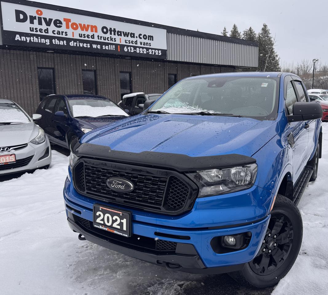 <p data-start=0 data-end=561>2021 FORD RANGER XLT 4WD SUPERCREW &ndash; TOUGH, CAPABLE & VERSATILE!<br data-start=64 data-end=67>LIKE NEW &ndash; LEGENDARY FORD TRUCK PERFORMANCE, SMOOTH RIDE & STRONG TOWING CAPABILITY!<br data-start=151 data-end=154 data-is-only-node=>2.3L ECOBOOST I4 ENGINE + AUTOMATIC TRANSMISSION &ndash; POWERFUL, EFFICIENT & BUILT FOR WORK OR PLAY!<br data-start=250 data-end=253>XLT TRIM WELL EQUIPPED WITH DESIRABLE FEATURES: BLUETOOTH, TOUCHSCREEN DISPLAY, APPLE CARPLAY & ANDROID AUTO, CRUISE CONTROL, KEYLESS ENTRY, ALLOY WHEELS & MORE!<br data-start=429 data-end=432>PERFECT FOR WORK, ADVENTURE OR DAILY DRIVING &ndash; COMFORTABLE CREW CAB, SHORT BOX & TRUE 4WD CAPABILITY!<br data-start=533 data-end=536>EASY FINANCING AVAILABLE!</p><p data-start=563 data-end=600>ADVERTISED PRICE IS OUR FINANCE PRICE</p><p data-start=602 data-end=811 data-is-last-node= data-is-only-node=>DRIVETOWNOTTAWA.COM &ndash; COME VISIT US / VENEZ NOUS VISITER!<br data-start=659 data-end=662>TAXES AND LICENSING EXTRA. SEE DRIVETOWNOTTAWA.COM FOR CASH PRICE FINANCING CHARGES APPLY (BANK FEES, PPSA, INTEREST). QUEBEC SAFETY FEE APPLICABLE.</p>