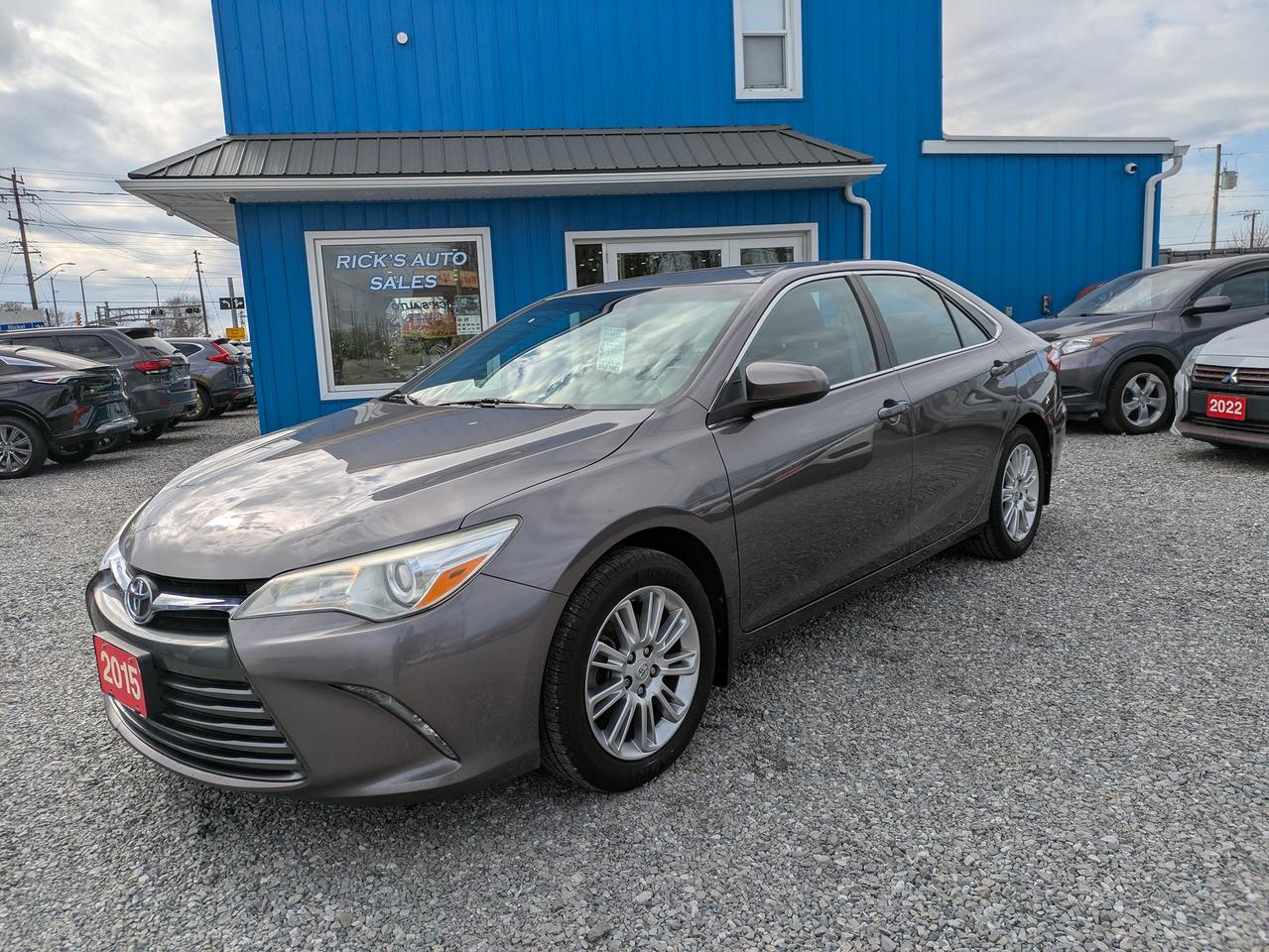 <p>Looking for a reliable and fuel-efficient sedan? Ricks Auto Sales has a great option for you: a 2015 Toyota Camry LE! This Camry is a proven favourite, known for its dependability and comfortable driving experience. With its sleek gray exterior and a practical gray interior, this Camry offers a timeless look that will keep you looking good on the road.</p><p>This Camry has been well-maintained and is ready for its next adventure. Under the hood, youll find a responsive I4 engine paired with a smooth automatic transmission, making it perfect for both city commutes and long highway drives. This 2015 Camry has 184,292km on the odometer.</p><p>Here are a few reasons why youll love this Camry:</p><ul><li><strong>Legendary Reliability:</strong> Toyota is synonymous with dependability, and this Camry is no exception, promising years of worry-free driving.</li><li><strong>Comfortable Interior:</strong> Enjoy a spacious and comfortable cabin, perfect for both daily commutes and road trips.</li><li><strong>Fuel Efficiency:</strong> Save money at the pump with this Camrys impressive fuel economy.</li><li><strong>Smooth Automatic Transmission:</strong> Experience effortless driving with the smooth-shifting automatic transmission.</li><li><strong>Proven Track Record:</strong> The Camry is a favourite for a reason. Its reputation for reliability and longevity makes it a smart choice.</li><li><strong>ONE OWNER</strong></li><li><strong>CLEAN CARFAX</strong></li></ul><p><strong><em>Powered by AutoIntelligence&trade;</em></strong> Vehicle information has been generated using artificial intelligence and is provided for informational purposes only. While efforts are made to ensure accuracy, please confirm all details directly with the dealer.</p><p style=margin: 0in;><strong><span lang=EN-CA style=font-size: 14.0pt; font-family: Segoe UI Emoji,sans-serif; mso-ascii-font-family: system-ui; mso-hansi-font-family: system-ui; color: #080809; mso-char-type: symbol-ext; mso-symbol-font-family: Segoe UI Emoji;>💥</span></strong><strong><span lang=EN-CA style=font-size: 14.0pt; font-family: system-ui,serif; color: #080809;>Why pay more?<span style=mso-spacerun: yes;>&nbsp; </span>At Rick&rsquo;s Auto Sales Cash or Finance=SAME PRICE.<span style=mso-spacerun: yes;>&nbsp; </span>Don&rsquo;t fall victim to dealer gimmicks&hellip;come to Rick&rsquo;s Auto Sales for transparent &ldquo;ALL IN&rdquo; pricing where there are no surprises&hellip;just grab your keys & skip the fees! </span></strong></p><p style=margin: 0in;><strong><span lang=EN-CA style=font-size: 14.0pt; font-family: system-ui,serif; color: #080809;>&nbsp;</span></strong></p><p style=margin: 0in;><strong><span lang=EN-CA style=font-size: 14.0pt; font-family: system-ui,serif; color: #080809;><span style=mso-spacerun: yes;>&nbsp;</span>We service what we sell!&nbsp; The purchase price INCLUDES Certification with a 30-day/1500 km warranty covering any mechanical issues.&nbsp; Vehicles come standard with ONE key (if we receive more than ONE key, we will include it).&nbsp; Options to purchase additional warranty and Corrosion-Free rustproofing are also available.&nbsp; Financing is available on qualifying vehicles.</span></strong></p><p style=margin: 0in;><strong><span lang=EN-CA style=font-size: 14.0pt; font-family: system-ui,serif; color: #080809;>This is your Hometown Pre-Owned Sales Centre.&nbsp; As an Independently Owned and operated Automotive Centre for over 20 years, we know our customers are the core of our business.&nbsp; We pride ourselves on providing our customers with heartfelt service, Honesty and Integrity are our mottos.</span></strong></p><p style=margin: 0in;><strong><span lang=EN-CA style=font-size: 14.0pt; font-family: system-ui,serif; color: #080809;><span style=mso-spacerun: yes;>&nbsp;</span></span></strong></p><p style=margin: 0in;><strong><span lang=EN-CA style=font-size: 14.0pt; font-family: system-ui,serif; color: #080809;>Servicing the entire Niagara Region and beyond!&nbsp; **CHECK OUT OUR REVIEWS AND OUR FACEBOOK PAGE**</span></strong></p><p style=margin: 0in;><strong><span lang=EN-CA style=font-size: 14.0pt; font-family: system-ui,serif; color: #080809;>Book an appointment or stop in for a test drive TODAY, you won&rsquo;t be disappointed!</span></strong></p><p style=margin: 0in;><strong><span lang=EN-CA style=font-size: 14.0pt; font-family: system-ui,serif; color: #080809;>Rick&rsquo;s Auto Sales (UCDA MEMBER) BUY WITH CONFIDENCE</span></strong></p>
