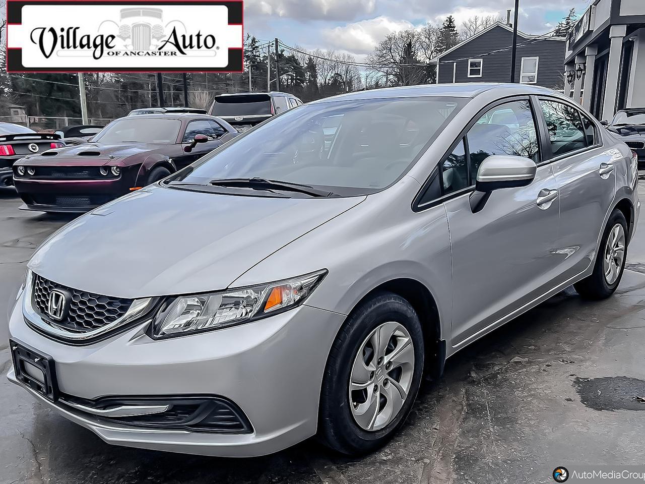 2015 Honda Civic 4dr Auto LX Photo2