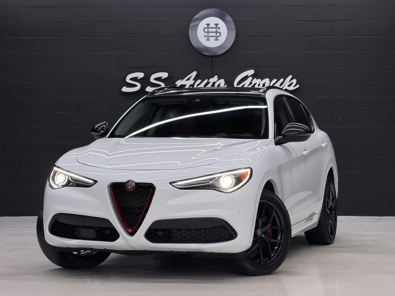 <p class=MsoNormal><span style=font-size: 9pt; line-height: 107%; color: rgb(0, 0, 0);>EXTENDED WARRANTY PACKAGES AVAILABLE UPTO 4 YEARS UNLIMITED KMS. &nbsp;CARFAX REPORT IS AVAILABLE UPON REQUEST.</span></p><p class=MsoNormal><span style=font-size: 9pt; line-height: 107%; color: rgb(0, 0, 0);>&nbsp;</span></p><p class=MsoNormal style=mso-margin-top-alt: auto; mso-margin-bottom-alt: auto; line-height: normal;><span style=font-size: 9pt; color: rgb(0, 0, 0); background-image: initial; background-position: initial; background-size: initial; background-repeat: initial; background-attachment: initial; background-origin: initial; background-clip: initial;>2021 ALFA ROMEO STELVIO TI Q4 AWD HAS LANDED.&nbsp;&nbsp;2.0L TURBOCHARGED 4 CYLINDER PRODUCING OVER 280HP AND 306LB/FT OF TORQUE.&nbsp;&nbsp;WHITE EXTERIOR ON RED INTERIOR. <span style=mso-spacerun: yes;>&nbsp;</span>LOADED WITH NAVIGATION, BACKUP CAMERA, 360 PARKING SENSORS, BLINDSPOT ASSIST, LANE KEEP ASSIST, FORWARD COLLISION WARNING, ADAPTIVE CRUISE CONTROL, ADAPTIVE STEERING ASSIST, DRIVER ATTENTION ASSIST, INTELLIGENT SPEED CONTROL, LIVE TRAFFIC UPDATE, AUTOMATIC HIGH BEAM, APPLE CARPLAY, ANDROID AUTO, HEATED SEATS, HEATED STEERING, PANORAMIC SUNROOF, ALFA DRIVE MODE EXPLORER (ECO, NATURAL, DYNAMIC), PREMIUM 20 INCH WHEELS, DRIVERS ASSISTANCE PACKAGE, AUTO LED HEADLIGHTS, PUSH BUTTON START, BLUETOOTH, KEYLESS COMFORT ACCESS, AND MUCH MORE.</span></p><p class=MsoNormal><span style=font-size: 9pt; line-height: 107%; color: rgb(0, 0, 0);>&nbsp;</span></p><p class=MsoNormal><span style=color: rgb(0, 0, 0);><strong><span style=font-size: 9.0pt; line-height: 107%; mso-bidi-font-family: Calibri; mso-bidi-theme-font: minor-latin;>CERTIFICATION AVAILABLE FOR AN ADDITIONAL $999 &ndash;&nbsp;</span></strong><span style=font-size: 9.0pt; line-height: 107%; mso-bidi-font-family: Calibri; mso-bidi-theme-font: minor-latin;>IF NOT CERTIFIED AS PER OMVIC REGULATIONS THE VEHICLE IS DEEMED NOT DRIVABLE AND UNCERTIFIED.&nbsp;&nbsp;THIS FEE WILL ENSURE VEHICLE IS CERTIFIED AND ROAD WORTHY CONDITION. ADVERTISED PRICE EXCLUDES APPLICABLE TAXES, LICENSING, ADMINISTRATIVE, AND FINANCE FEES.</span></span></p><p class=MsoNormal><span style=font-size: 9pt; line-height: 107%; color: rgb(0, 0, 0);>&nbsp;</span></p><p class=MsoNormal><span style=font-size: 9pt; line-height: 107%; color: rgb(0, 0, 0);>OUR VEHICLES ARE PRICED TO SELL.&nbsp; DRIVE THIS HOME TODAY!&nbsp;&nbsp;CONTACT US FOR MORE DETAILS.</span></p><p class=MsoNormal><span style=font-size: 9pt; line-height: 107%; color: rgb(0, 0, 0);>&nbsp;</span></p><p class=MsoNormal><span style=font-size: 9pt; line-height: 107%; color: rgb(0, 0, 0);>S S AUTO GROUP INC.</span></p><p class=MsoNormal><span style=font-size: 9pt; line-height: 107%; color: rgb(0, 0, 0);>460 WOODY ROAD</span></p><p class=MsoNormal><span style=font-size: 9pt; line-height: 107%; color: rgb(0, 0, 0);>OAKVILLE, ONTARIO L6K 3T6</span></p><p class=MsoNormal><span style=font-size: 9pt; line-height: 107%; color: rgb(0, 0, 0);>&nbsp;</span></p><p class=MsoNormal><span style=font-size: 9pt; line-height: 107%; color: rgb(0, 0, 0);>CALL: (9 0 5) - 3 3 8 - 7 7 0 7</span></p><p class=MsoNormal><span style=font-size: 9pt; line-height: 107%; color: rgb(0, 0, 0);>TEXT: (6 4 7) - 8 8 6 - 8 1 8 2&nbsp; OR&nbsp; (6 4 7) - 5 2 3 - 0 0 6 9</span></p><p class=MsoNormal><span style=font-size: 9pt; line-height: 107%; color: rgb(0, 0, 0);>INSTAGRAM: @SSAUTOGROUP_</span></p>