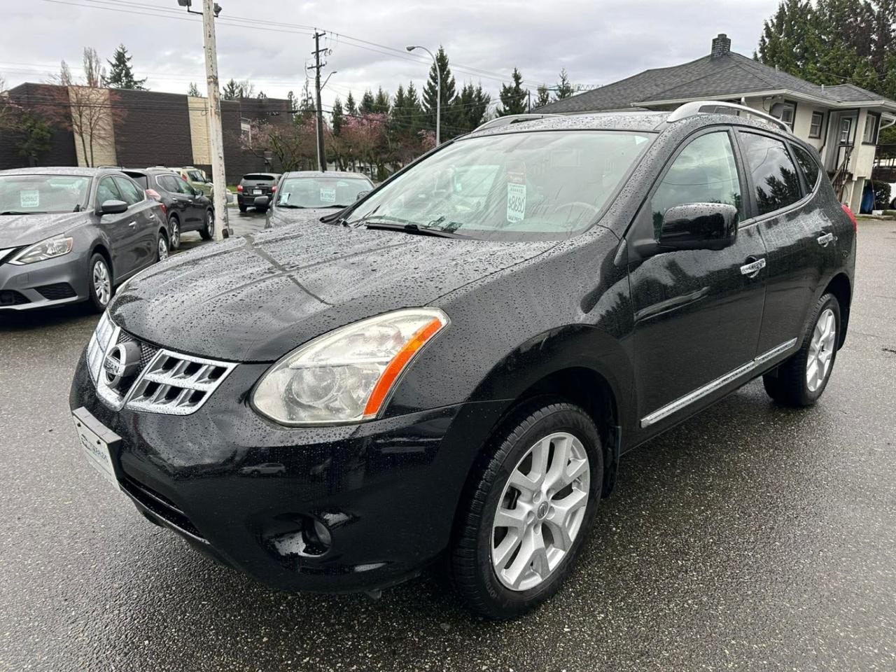 <p> <strong>2013 Nissan Rogue SL AWD</strong> </p><p> <em>Fully Loaded  AWD  Super Clean!</em> </p><p> 213,759 KM<br> Automatic<br> All-Wheel Drive <br> 360° Camera + Backup Cam <br> Leather Interior<br> Heated Seats <br> Power Sunroof <br> Power Windows, Locks, Mirrors & Seats<br> Cruise Control<br> Ice Cold A/C <br> Alloy Wheels</p><p> <em>Very clean & loaded with options  drives great!</em></p><p><span id=jodit-selection_marker_1774029149643_09827750099094268 data-jodit-selection_marker=start style=line-height: 0; display: none;></span><br></p> <p><br></p><p>Excellent, Affordable Lubrico Warranty Options Available on ALL Vehicles!</p><p><span style=background-color: rgba(var(--bs-white-rgb),var(--bs-bg-opacity)); color: var(--bs-body-color); font-family: open-sans, -apple-system, BlinkMacSystemFont, "Segoe UI", Roboto, Oxygen, Ubuntu, Cantarell, "Fira Sans", "Droid Sans", "Helvetica Neue", sans-serif; font-size: var(--bs-body-font-size); font-weight: var(--bs-body-font-weight); text-align: var(--bs-body-text-align);>All Vehicles are Safety Inspected by a 3rd Party Inspection Service.&nbsp;</span><br><br>We speak English, French, German, Punjabi, Hindi and Urdu Language!&nbsp;</p><p><br>We are proud to have sold over 15,000 vehicles to our customers throughout B.C. from this same&nbsp;location in Surrey.<span id=jodit-selection_marker_1747949601815_3502933354387793 data-jodit-selection_marker=start style=line-height: 0; display: none;></span></p><p><br>What Makes Us Different? <br>All of our vehicles have been sent to us from new car dealerships. They are all trade-ins and we are a large remarketing centre for the lower mainland new car dealerships. We do not purchase vehicles at auctions or from private sales. <br> <br>Administration Fee of $450<br> <br>Disclaimer: <br>Vehicle options are inputted from a VIN decoder. As we make our best effort to ensure all details are accurate we can not guarantee the information that is decoded from the VIN. Please verify any options before purchasing the vehicle. <br> <br>B.C. Dealers Trade-In Centre <br>14458 104th Ave. <br>Surrey, BC <br>V3R1L9 <br>DL# 26220</p><p> <br> </p><p>6-0-4-5-8-5-1-8-3-1</p>