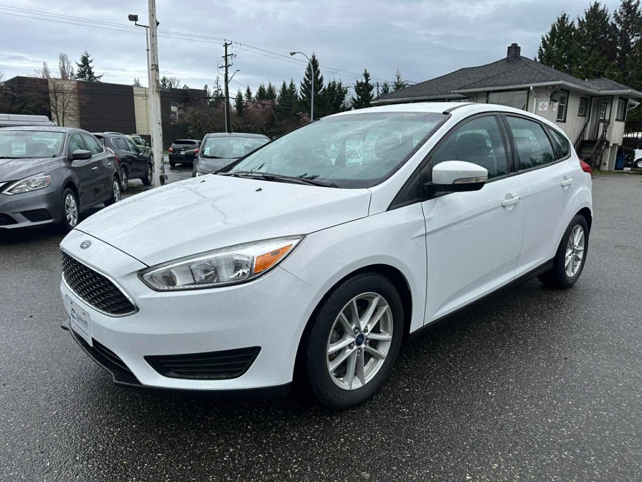 <p> <strong>2015 Ford Focus SE Hatchback</strong> </p><p> <em>Low KM  Sporty  Great on Gas!</em> </p><p> ONLY 89,311 KM<br> Automatic<br> Bluetooth <br> Backup Camera <br> Cruise Control<br> Ice Cold A/C <br> Power Windows, Locks & Mirrors<br> Power Seat<br> Alloy Wheels</p><p> <em>Low kilometers & drives great  perfect daily driver!</em></p><p><span id=jodit-selection_marker_1774028414720_5930060242650693 data-jodit-selection_marker=start style=line-height: 0; display: none;></span><br></p> <p><br></p><p>Excellent, Affordable Lubrico Warranty Options Available on ALL Vehicles!</p><p><span style=background-color: rgba(var(--bs-white-rgb),var(--bs-bg-opacity)); color: var(--bs-body-color); font-family: open-sans, -apple-system, BlinkMacSystemFont, "Segoe UI", Roboto, Oxygen, Ubuntu, Cantarell, "Fira Sans", "Droid Sans", "Helvetica Neue", sans-serif; font-size: var(--bs-body-font-size); font-weight: var(--bs-body-font-weight); text-align: var(--bs-body-text-align);>All Vehicles are Safety Inspected by a 3rd Party Inspection Service.&nbsp;</span><br><br>We speak English, French, German, Punjabi, Hindi and Urdu Language!&nbsp;</p><p><br>We are proud to have sold over 15,000 vehicles to our customers throughout B.C. from this same&nbsp;location in Surrey.<span id=jodit-selection_marker_1747949601815_3502933354387793 data-jodit-selection_marker=start style=line-height: 0; display: none;></span></p><p><br>What Makes Us Different? <br>All of our vehicles have been sent to us from new car dealerships. They are all trade-ins and we are a large remarketing centre for the lower mainland new car dealerships. We do not purchase vehicles at auctions or from private sales. <br> <br>Administration Fee of $450<br> <br>Disclaimer: <br>Vehicle options are inputted from a VIN decoder. As we make our best effort to ensure all details are accurate we can not guarantee the information that is decoded from the VIN. Please verify any options before purchasing the vehicle. <br> <br>B.C. Dealers Trade-In Centre <br>14458 104th Ave. <br>Surrey, BC <br>V3R1L9 <br>DL# 26220</p><p> <br> </p><p>6-0-4-5-8-5-1-8-3-1</p>