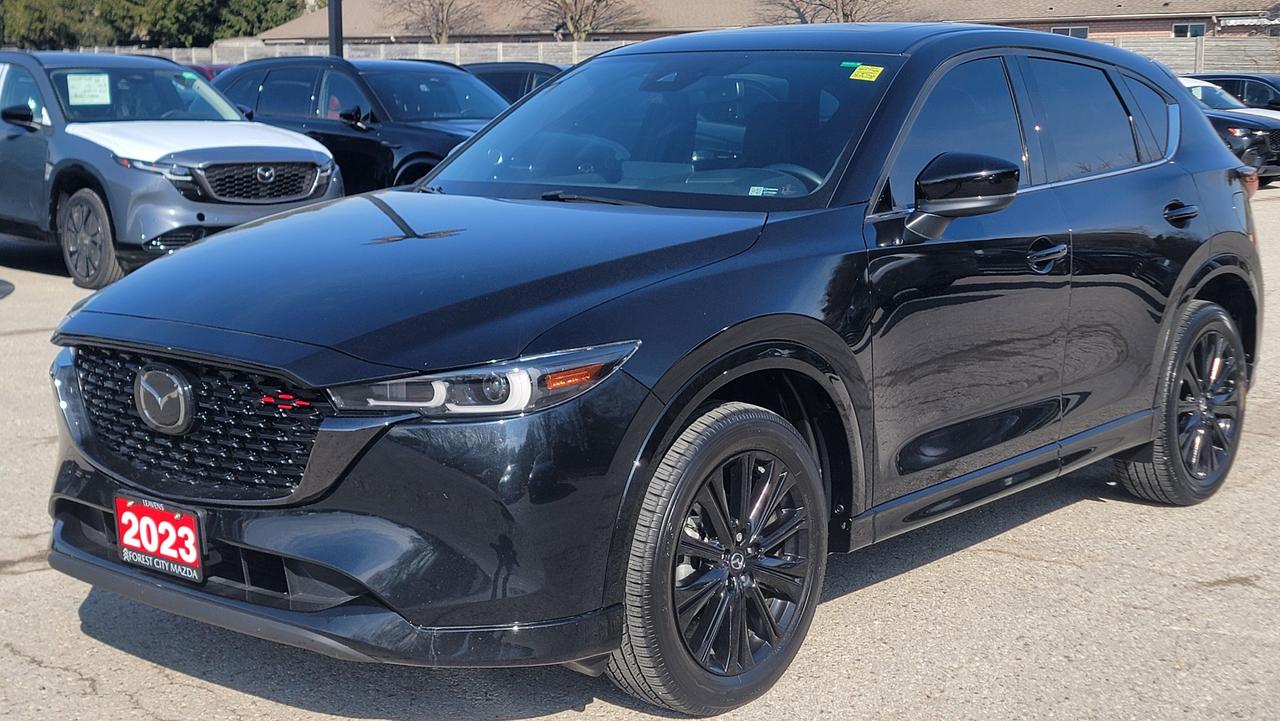 Check out this sleek and versatile 2023 Mazda CX-5 Sport AWD, offering the perfect balance of style, comfort, and performance. With 51,575 km, this well-kept SUV is ready for its next adventure.<br><br>Powered by a responsive and fuel-efficient 2.5L 4-cylinder engine paired with a 6-speed automatic transmission, this CX-5 delivers a smooth and confident driving experience. The AWD system provides excellent traction and control, making it ideal for all seasons and road conditions.<br><br>Finished in a bold black exterior, this SUV stands out with Mazdas signature styling and refined design. Inside, youll find a thoughtfully designed cabin focused on comfort and driver enjoyment.<br><br>? All-Wheel Drive capability<br>? Fuel-efficient and reliable 4-cylinder engine<br>? Modern, sporty design<br>? Spacious and comfortable interior<br>? Perfect for daily driving or weekend trips<br><br>Whether youre commuting, running errands, or heading out on a road trip, this CX-5 Sport is built to handle it all with ease.<br><br>?? Contact us today to schedule your test drivethis one wont last long!