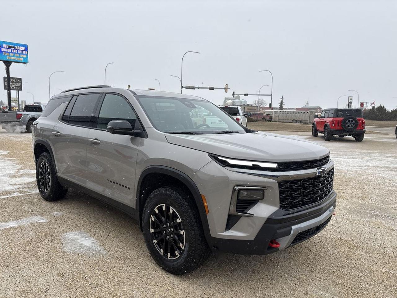 THE PRICE YOU SEE, PLUS GST. GUARANTEED!APPLE CARPLAY/ANDROID AUTO COMPATABLE! 2.5 LITER DOHC, 8 SPEED AUTO, Z71 AWD(227 PKG), 7 PASSENGER SEATING, JET BLACK LEATHER SEATS W/RED ACCENTS, REMOTE START, AUTOSENSE POWER LIFTGATE, HEATED FRONT SEATS, HEATED STEERING WHEEL, WIRELESS PHONE CHARGING,  TRAILERING EQUIPMENT W/ HITCHVIEW, PANORAMIC ROOF W/ POWER SLIDING SHADE, ENGINE BLOCK HEATER.      The 2026 Chevrolet Traverse Z71 AWD with the 227 Package represents a robust and versatile mid-size SUV designed for both off-road capability and on-road comfort. Equipped with the 2.5-liter engine, it offers a balance of efficiency and performance, providing adequate power for daily driving and light off-road adventures. The Z71 trim signifies enhanced off-road features, including upgraded suspension, skid plates, and all-terrain tires, making it well-suited for rugged terrains. The AWD (All-Wheel Drive) system ensures better traction and stability in diverse driving conditions, adding to its versatility. The 227 Package, although not a standard designation, likely refers to specific features or upgrades that enhance the vehicles aesthetics, technology, or comfort, possibly including unique wheels, badging, or interior enhancements. The Driver Confidence Package further emphasizes safety and driver assistance, encompassing advanced features such as adaptive cruise control, lane departure warning, automatic emergency braking, and blind-spot monitoring, all aimed at providing a safer and more confident driving experience. Overall, the 2026 Chevrolet Traverse Z71 AWD with these packages combines rugged capability, modern safety features, and family-friendly utility in a stylish and capable SUV.Do you want to know more about this vehicle, CALL, CLICK OR COME ON IN!*AMVIC Licensed Dealer; CarFax and Full Mechanical Inspection Included.