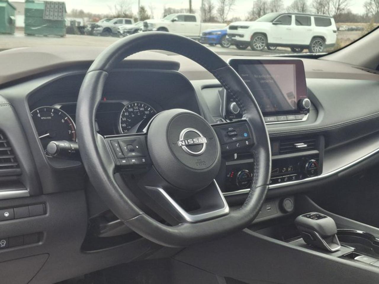 2023 Nissan Rogue SV AWD | Pano Roof | Heated Seats + Steering | CarPlay | Remote Start | and More ! Photo