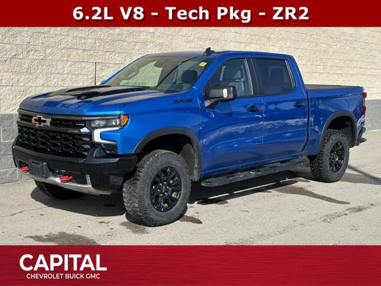 Ask for the Internet Department for more information or book your test drive today! Call 403-256-4960 for fast answers at your fingertips! Disclaimer: All prices are plus taxes. See dealer for details. AMVIC Licensed Dealer # B2020028.2023 Silverado 1500 10-Speed Automatic 4WD Silverado 1500 ZR2, EcoTec3 6.2L V8, 4WD, 10-Way Power Driver Seat w/Lumbar, 10-Way Power Passenger Seat Adjuster w/Lumbar, 12.3 Multicolour Reconfigurable Digital Display, 120-Volt Bed Mounted Power Outlet, 120-Volt Instrument Panel Power Outlet, 15 Diagonal Multicolour Head-Up Display, 170 Amp Alternator, 2 USB Data Ports, 2nd Row Heated Outboard Seats, Adaptive Cruise Control, All-Weather Floor Liner (LPO), Auto-Dimming Inside Rear-View Mirror, Bed View Camera, Bluetooth® For Phone, Chevrolet Connected Access Capable, Chevytec Spray-On Black Bedliner, Colour-Keyed Carpeting Floor Covering, Compass, Deep-Tinted Glass, Driver Memory, Dual Exhaust, Dual Rear USB Ports (Charge Only), Electric Rear-Window Defogger, Electrical Steering Column Lock, Electronic Cruise Control, EZ Lift Power Lock & Release Tailgate, Floor Mounted Centre Console, Front LED Fog Lamps, Front Rainsensing Wipers, HD Surround Vision, Heated Driver & Front Outboard Passenger Seats, Heated Steering Wheel, Heavy-Duty Air Filter, High Gloss Black Mirror Caps, Hill Descent Control, Hitch Guidance, Hitch Guidance w/Hitch View, Integrated Trailer Brake Controller, Keyless Open & Start, LED Cargo Area Lighting, Manual Tilt/Telescoping Steering Column, OnStar & Chevrolet Connected Services Capable, Outside Heated Power-Adjustable Mirrors, Performance Red Recovery Hooks, Perimeter Lighting, Power Front Passenger Windows w/Express Up/Down, Power Front Windows w/Driver Express Up/Down, Power Rear Windows w/Express Down, Power Sliding Rear Window w/Rear Defogger, Power Tilt & Telescoping Steering Column, Preferred Equipment Group 3LT, Rear Camera Mirror, Rear Cross Traffic Alert-Braking, Rear Park Assist, Rear Pedestrian Alert, Rear Wheelhouse Liners, Remote Vehicle Starter System, Safety Alert Seat, SiriusXM w/360L, Standard Tailgate, Steering Wheel Audio Controls, Technology Package, Theft Deterrent System (Unauthorized Entry), Trailer Camera Provisions, Trailer Side Blind Zone Alert, Trailering App, Trailering Package, Universal Home Remote, Up-Level Rear Seat w/Storage Package, Ventilated Driver & Front Passenger Seats, Wheels: 18 x 8.5 Gloss Black, Wi-Fi Hot Spot Capable, Wireless Charging, Wireless Phone Projection, Wrapped Steering Wheel.