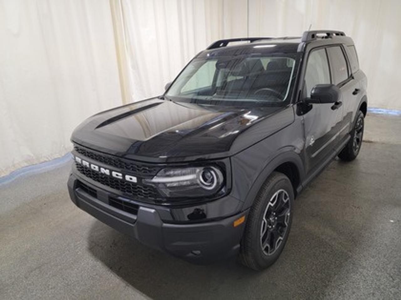 This all-new 2026 Ford Bronco Sport Outer Banks 300A shines in Shadow Black. This 5-passenger compact SUV is powered by the 1.5L EcoBoost® engine, delivering 181 horsepower and 190 lb-ft of torque. With an 8-speed automatic transmission and Auto Start-Stop Technology, it offers a smooth yet efficient drive, ideal for city commutes or highway adventures.

Key Features:
Premium-Trimmed Sport Heated Front Seats
Premium-Wrapped Heated Steering Wheel
Rear Parking Sensors
Memory Drivers Seat 
6-Way Power Passenger Seat
Push-Button Start
SYNC® 4 with a 13.2-inch Center Display, Wireless Apple CarPlay® and Android Auto
18 Machined-Face Ebony Black-Painted Aluminum Wheels
Dual-Zone Temperature Control
Terrain Management System Electronic Automatic  with 5 G.O.A.T. Modes (Normal, ECO, Sport, Slippery, Off-Road)
LED Headlights, Fog Lights, and Signature Lights
FordPass® Connect with Remote Start

This vehicle comes with the All-Weather Packageready to take on any season!
Snow, rain, mud, or sunshinethis vehicle is built for it all! The All-Weather Package adds extra protection where it matters most, with premium mud flaps to shield your paint from road debris, all-weather floor mats to protect your interior from lifes messes, and Xpel paint protection to help guard against those infuriating rock chips. Drive with confidence, knowing your investment is protected from Regina's elements.
 
Bennett Dunlop Ford, proudly serving Regina for over 40 years, is conveniently located at 770 Broad Street. With over 3,500 Google reviews, our reputation reflects our commitment to providing a fast, easy, and enjoyable vehicle-buying experience. We eliminate the hassle with no admin or documentation fees, transparent upfront pricing that lets you shop with total confidence. But were more than just a dealershipwere driven to make a difference by supporting local community initiatives and events that matter to you. Visit Bennett Dunlop Ford today and experience why were Reginas trusted choice for quality vehicles, exceptional service, and a genuine commitment to driving change in our community!