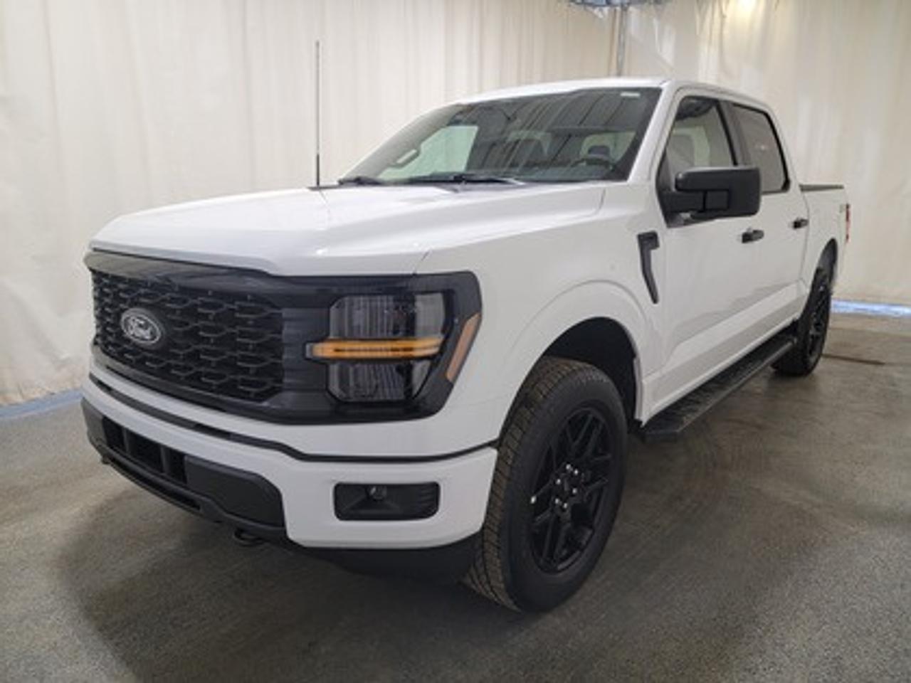 This all-new 2026 Ford F-150 STX 200A looks absolutely stunning in Oxford White. This pickup comes with the 2.7L EcoBoost engine, delivering 325 horsepower and 400 lb-ft of torque. By leveraging EcoBoost technology and a 10-speed automatic transmission, this truck achieves an impressive fuel economy of 11.8L/100km (24 miles per gallon) combined highway/city. 

Key Features:
12 LCD Captivity Touchscreen
Electronic Power-Assist Steering
Cruise Control
Power Windows
AdvanceTrac® With Roll Stability Control
Perimeter Alarm
Ford Co-Pilot360
Lane Keeping System
Rear View Camera
Rear Parking Sensors
Reverse Park Assist
Class IV Trailer Hitch
Remote Start
SYNC®4
Apple Car Play
Bluetooth Connectivity
20 All Terrain Tires
Black Appearance Package
Engine Block Heater
Trailer Brake Controller

This vehicle comes with the All-Weather Packageready to take on any season!
Snow, rain, mud, or sunshinethis vehicle is built for it all! The All-Weather Package adds extra protection where it matters most, with premium mud flaps to shield your paint from road debris, all-weather floor mats to protect your interior from lifes messes, and Xpel paint protection to help guard against those infuriating rock chips. Drive with confidence, knowing your investment is protected from Regina's elements.

Bennett Dunlop Ford, proudly serving Regina for over 40 years, is conveniently located at 770 Broad Street. With over 3,500 Google reviews, our reputation reflects our commitment to providing a fast, easy, and enjoyable vehicle-buying experience. We eliminate the hassle with no admin or documentation fees, transparent upfront pricing that lets you shop with total confidence. But were more than just a dealershipwere driven to make a difference by supporting local community initiatives and events that matter to you. Visit Bennett Dunlop Ford today and experience why were Reginas trusted choice for quality vehicles, exceptional service, and a genuine commitment to driving change in our community!