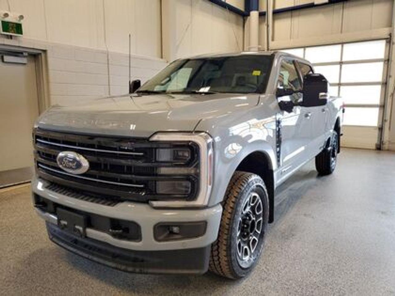 This all new 2026 Ford F-350 Platinum Crew Cab 4X4 713A looks absolutely stunning in Glacier Grey Metallic. This heavy duty picks up comes with the 6.7L Power Stroke Diesel engine. This remarkable engine not only produces 475 horsepower and 1,050 ft pounds of torque, but by leveraging technology and a 10-speed automatic transmission. This truck can tow up to a massive amount of 20,000 pounds!

Key Features:
Adaptive Cruise Control 
Lane Keeping System
Rear View Camera 
Power Tailgate
Wireless Charging Pad
Power Deployable Running Boards
Tailgate Step
Remote Tailgate Release
Heated Steering Wheel
Heated Front & Rear Seats 
Ventilated Front Seats 
Ford Connectivity Package 
12 Productivity Screen  
LED Box Lighting
Driver Memory Seat System
Ford Co-Pilot360 Assist 2.0
360 Degree Camera
Rain Sensing Wipers 
B&O Sound System
Rear Parking Sensors 
Intelligent Access W/ Push Button Start 
Apple CarPlay & Android Auto Compatibility 
Cruise Control 
Remote Keyless Entry
Power Moonroof

Moose Jaw Ford, conveniently located at 1010 North Service Road in Moose Jaw, is your trusted destination for all your automotive needs. With an impressive 4.8-star Google rating from nearly 1,500 reviews, we are proud to deliver an exceptional vehicle-buying experience tailored just for you. Our Moose Jaw Motives set us apart, offering unbeatable value like half-priced oil changes for life on pre-owned vehicles, one year of key and remote protection, and one year of tire and rim protection. Enjoy peace of mind with every purchase. At Moose Jaw Ford, were committed to driving positive change in our community by combining exceptional service, high-quality vehicles, and a guest-first approach. Visit us today!
