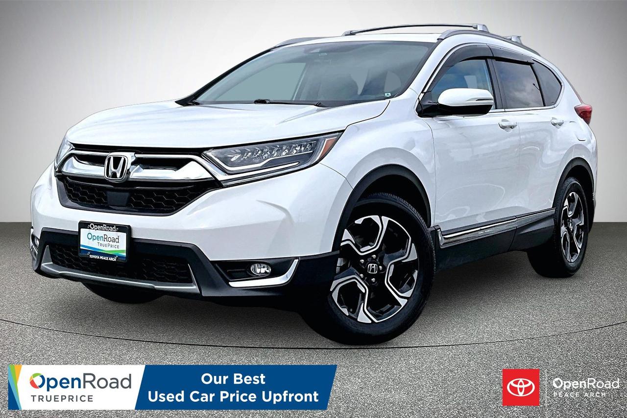 The 2019 Honda CR-V Touring AWD CVT is a well-equipped compact SUV designed for comfort, efficiency, and advanced safety. It features a 1.5 litre turbocharged 4-cylinder engine producing about 190 horsepower and 179 lb-ft of torque paired with a continuously variable transmission and Real Time AWD with Intelligent Control for improved traction. Interior highlights include leather-trimmed seating, heated front and rear seats, a heated steering wheel, power tailgate, dual-zone automatic climate control, and driver seat memory. Technology includes a 7-inch touchscreen with Apple CarPlay, Android Auto, Bluetooth, SiriusXM, and HondaLink connectivity. Safety features include Honda Sensing technologies such as adaptive cruise control, lane keeping assist, collision mitigation braking, blind-spot monitoring, and a multi-angle rearview camera.  Have confidence with your OpenRoad purchase! Every OpenRoad Certified Pre-Owned vehicle comes fully reconditioned and complete with a comprehensive 153 point mechanical inspection, a CarFax history & lien report, a 3-Day Money Back Guarantee, a 30-Day/2,000 kms Exchange Policy, a 90-Day/5,000 kms Powertrain Warranty, guaranteed clear title, and membership to our exclusive Club OpenRoad! As a proud member of the OpenRoad Auto Group, a trusted name since 2000 serving the Lower mainland (including White Rock, Surrey, Langley, Maple Ridge, Delta, Richmond, Mission and beyond) with outstanding Toyota vehicles, Toyota parts, and Toyota service since 1966! OpenRoad Toyota Peace Arch is a &ldquo;True Price&rdquo; dealer, meaning no inflated prices, and no need for back and forth haggling! We use up to the minute technology offering LIVE MARKET VALUE PRICING to ensure you are receiving the most competitive price possible on all of our Pre-Owned vehicles!  All advertised vehicle prices do not include our $699 documentation fee.