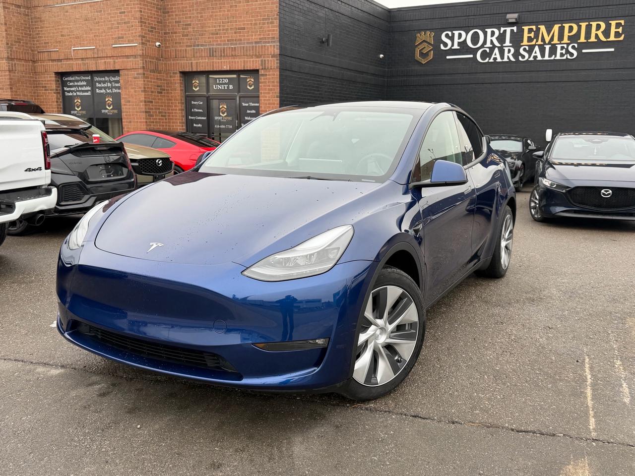 *FULLY LOADED* *LONG RANGE* *AWD* *7 SEATER* *HEATED SEATS* *SUNROOF* *AUTOMATIC* *BLIND SPOT MONITORING* *REVERSE CAMERA* *MINT CONDITION* Finance price: $35,880+ HST Cash price: $36,880+ HST Year :2023 Make: Tesla Model: Y Trim: Long Range AWD Kms: 69,202 Sport empire cars Offering a beautiful 7 seater Tesla Model Y long Range AWD with ONLY 69,202 kms!! For the affordable price of $35,880+HST and licensing. Beautiful Blue exterior with a Black Leather interior!! Professionally detailed and ready to go. Perfect combination of reliability, comfort and luxury. Buy with Trust with an Ontario registered dealer. Please note: The listed price is a finance-only special. If you wish to purchase the vehicle with cash, a $1,000 premium will be added to the sale price. ** In accordance with OMVIC regulations, please be advised that the vehicle being offered is not currently certified, e-tested or drivable. Certification is available for an additional fee starting from $699. With our safety package the vehicle comes with a 36 day safety standard warranty, complimentary oil change and inspection report VIN: 7SAYGAEE0PF673636
