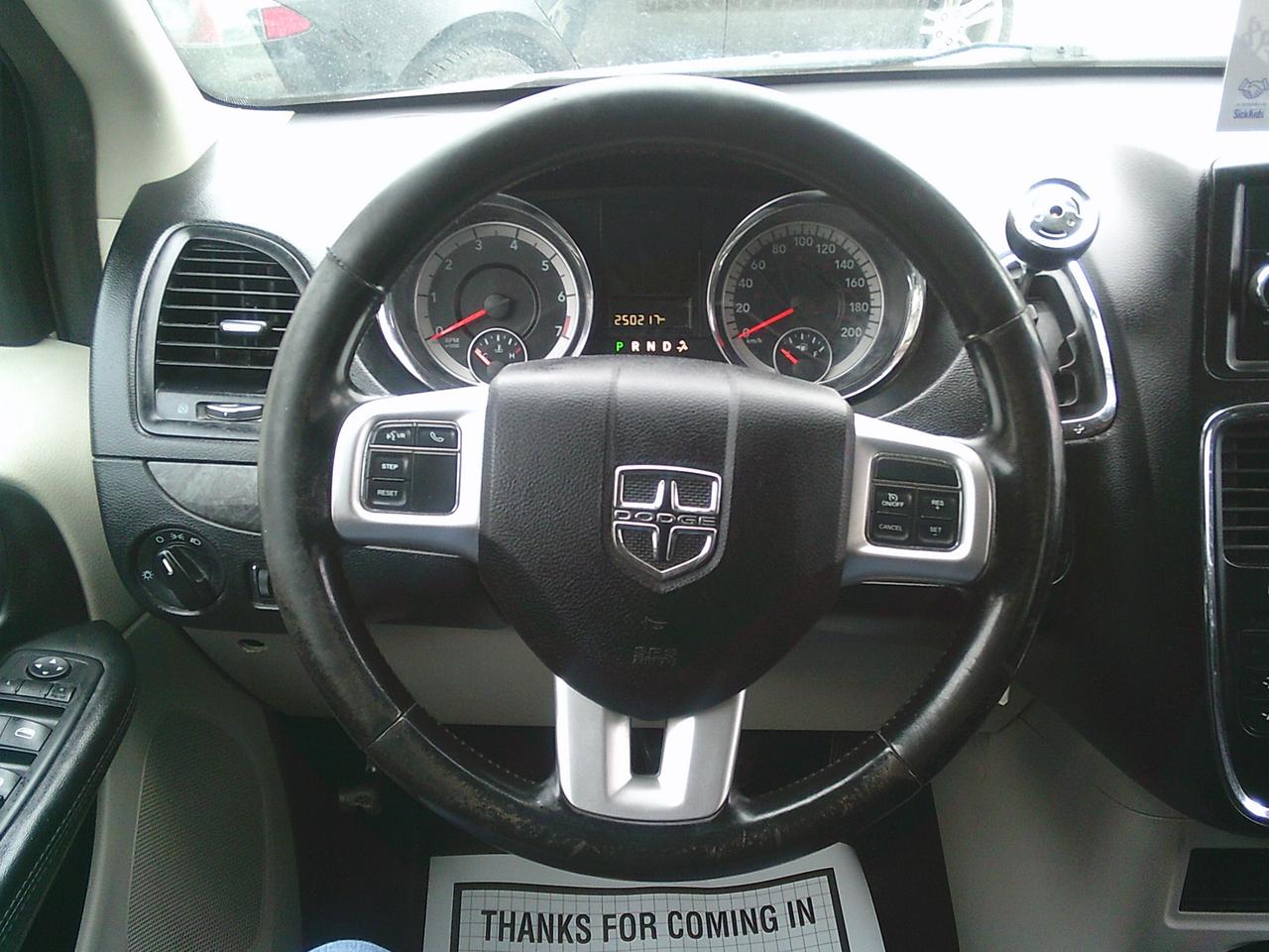 2014 Dodge Grand Caravan stow-go 4dr Wgn SXT + STOW N GO Photo