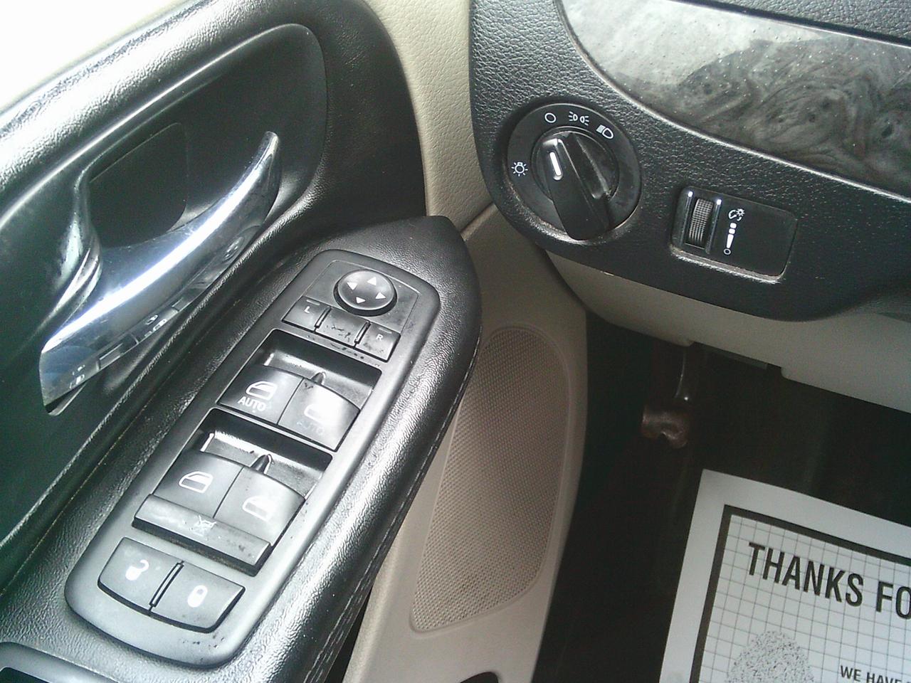 2014 Dodge Grand Caravan stow-go 4dr Wgn SXT + STOW N GO Photo