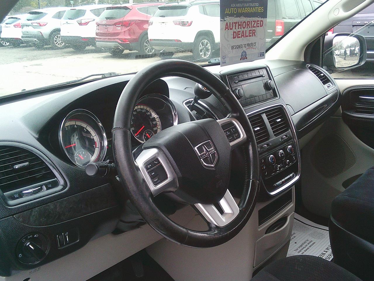 2014 Dodge Grand Caravan stow-go 4dr Wgn SXT + STOW N GO Photo