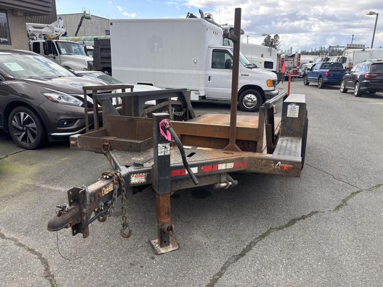 2013 JLG Industries, 1014 FLAT Tilt Deck Tandem axle heavy duty trailer, hydraulic tilting deck metal deck, 56 TONGUE TO START OF DECK, 15 DECK TO TAIL, 6 WIDTH  $8,770.00 plus $375 processing fee, $9,145.00 total payment obligation before taxes.   Listing report, warranty, contract commitment cancellation fee, financing available on approved credit (some limitations and exceptions may apply). All above specifications and information is considered to be accurate but is not guaranteed and no opinion or advice is given as to whether this item should be purchased. We do not allow test drives due to theft, fraud, acts of vandalism and undetectable impaired driving. Instead we provide the following benefits: Complimentary Warranty (with options to extend), Limited Money Back Satisfaction Guarantee on Fully Completed Contracts, Contract Commitment Cancellation, and an Open-Ended Sell-Back Option. Ask seller for details or call 604-522-REPO(7376) to confirm listing availability.