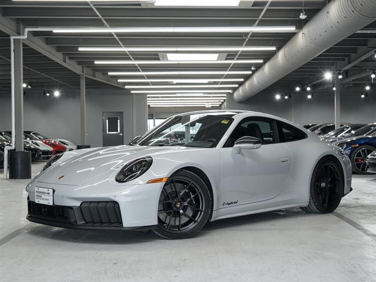 ***Leasing Options Available on Certified Pre-Owned Porsches***  The Porsche that you’ve always wanted. This 2025 911 Carrera 4 GTS has a Clean CarFax Report. With Leather Interior in Black with Chalk Stitching, Ice Grey Metallic ($950), Premium Package ($5,250), Burmester® High-End Surround Sound System ($4,530), Electric Slide/Tilt Sunroof in Glass ($2,280), SportDesign Side Skirts ($1,480),  Exterior Mirror Upper Trims in Carbon Fiber ($1,860), Exclusive Design Fuel Cap ($190), Rear Lid Grille Vertical Slat Inlays in Exterior Color ($820), Power Steering Plus ($350), Front Axle Lift System ($3,400), Brake Calipers in High Gloss Black ($1,030), Heated GT Sport Steering Wheel in Leather, Porsche Crest on Headrests (Front)($350), Adaptive Sport Seats Plus (18-way) with Memory Package ($3,460), Rear Seats, Ventilated Seats (Front)($960), 930 Leather Package ($1,700), Door-Sill Guards in Matte Carbon Fiber, Illuminated ($1,460), Interior Trim Inlays in Matte Carbon Fiber with Trim in Ceramica ($1,370), Exclusive Design Taillights ($250), and Under Door Puddle Light Projectors ($190), this is the car for you! Look for the Porsche Approved seal when buying a pre-owned Porsche. Porsche Approved Pre-Owned Cars are inspected in compliance with our 111-point checklist, and any work required is performed using only 100% Porsche Genuine Parts. As proof of the trust that we have in the quality of our vehicles, every certified pre-owned car comes with a minimum of 24 months Porsche Approved Warranty and Porsche Roadside Assistance. The Porsche Approved Warranty covers all components of your Porsche and offers the same level of security as our new car warranty. Luxury Tax is not charged on Certified Pre-Owned vehicles. Call us at 613-749-4275 and ask to speak to one of our Porsche Brand Executives. Serving the Ottawa & Gatineau region. *** Options de location disponibles pour les Porsche doccasion certifiées ***  La Porsche de vos rêves. Cette voiture 2025 911 Carrera 4 GTS a un bon rapport d’historique de véhicule de CarFax. Grâce à Leather Interior in Black with Chalk Stitching, Ice Grey Metallic ($950), Premium Package ($5,250), Burmester® High-End Surround Sound System ($4,530), Electric Slide/Tilt Sunroof in Glass ($2,280), SportDesign Side Skirts ($1,480),  Exterior Mirror Upper Trims in Carbon Fiber ($1,860), Exclusive Design Fuel Cap ($190), Rear Lid Grille Vertical Slat Inlays in Exterior Color ($820), Power Steering Plus ($350), Front Axle Lift System ($3,400), Brake Calipers in High Gloss Black ($1,030), Heated GT Sport Steering Wheel in Leather, Porsche Crest on Headrests (Front)($350), Adaptive Sport Seats Plus (18-way) with Memory Package ($3,460), Rear Seats, Ventilated Seats (Front)($960), 930 Leather Package ($1,700), Door-Sill Guards in Matte Carbon Fiber, Illuminated ($1,460), Interior Trim Inlays in Matte Carbon Fiber with Trim in Ceramica ($1,370), Exclusive Design Taillights ($250), and Under Door Puddle Light Projectors ($190), cette voiture est parfaite pour vous! Trouvez le sceau d’approbation de Porsche lorsque vous achetez une Porsche d’occasion. Les voitures d’occasion approuvées par Porsche sont inspectées conformément à notre liste de vérification de 111 points. Tout travail requis est effectué en utilisant uniquement des pièces d’origine Porsche. Comme preuve de la confiance que nous avons dans la qualité de nos véhicules, chaque voiture d’occasion certifiée fait l’objet d’une garantie d’au moins 24 mois approuvée par Porsche et de l’assistance routière Porsche. La garantie approuvée par Porsche couvre tous les composants de votre Porsche et offre le même niveau de sécurité que notre garantie pour les véhicules neufs. La taxe de luxe n’est pas appliquée aux véhicules d’occasion certifiés. Appelez-nous au 613-749-4275 pour parler à l’un de nos directeurs de marque Porsche. Au service de la région d’Ottawa et du Gatineau.