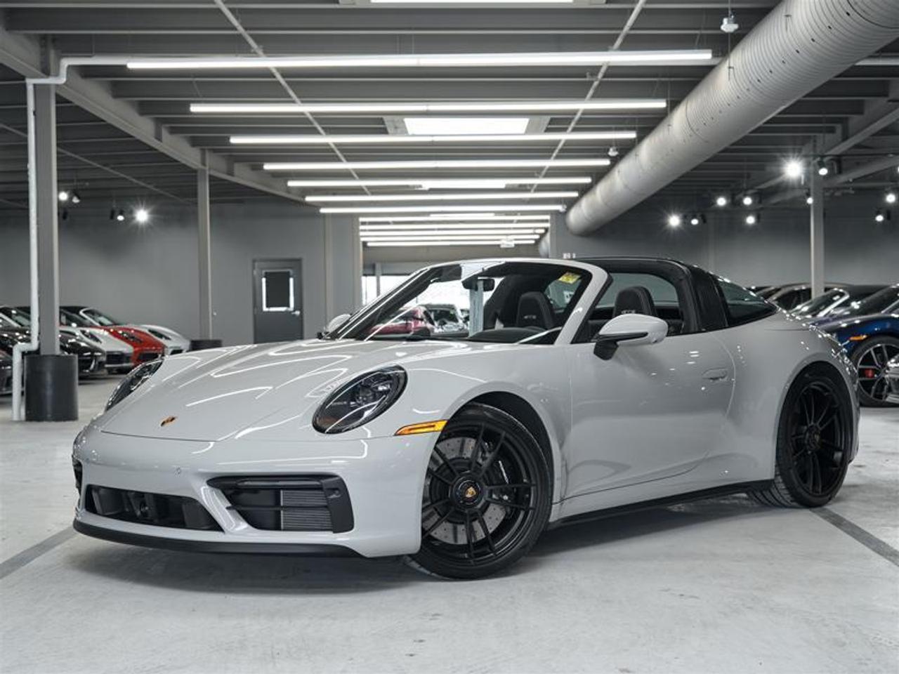 ***Leasing Options Available on Certified Pre-Owned Porsches*** The Porsche that you’ve always wanted. This 2024 911 Targa 4 GTS (MY24) has a Clean CarFax Report. With GTS Interior Package in Chalk ($5,170), Chalk ($3,730), Premium Package ($4,290), Burmester® High-End Surround Sound System ($4,540), SportDesign Side Skirts in Matte Black ($1,480), Under Door Puddle Light Projectors ($190), Exclusive Design Fuel Cap ($190), Deletion of GTS Logo on Front Doors, Front Axle Lift System ($3,150), Rear Axle Steering ($2,390), Brake Calipers in High Gloss Black ($1,030), Adaptive Sport Seats Plus (18-way) with Memory Package ($3,220), Heated GT Sport Steering Wheel in Race-Tex with Trim in Matte Carbon Fiber ($780), Central Tachometer in Chalk ($480), Interior Trim Inlays in Matte Carbon Fiber ($4,520), Extended Dashboard and Door Panel Package in Leather ($3,920), Pedals and Footrest in Aluminum ($720), Door-Sill Guards in Matte Carbon Fiber, Illuminated ($1,460), Sun Visors in Race-Tex ($680), LED-Matrix Design Headlights in Black incl. Porsche Dynamic Light System Plus (PDLS+) ($2,160), Ionizer ($390). and Porsche InnoDrive incl. Adaptive Cruise Control (ACC) and Active Lane Keep (ALK) ($3,450), this is the car for you! Look for the Porsche Approved seal when buying a pre-owned Porsche. Porsche Approved Pre-Owned Cars are inspected in compliance with our 111-point checklist and any work required is performed using only 100% Porsche Genuine Parts. As proof of the trust that we have in the quality of our vehicles, every certified pre-owned car comes with a minimum of 24 months Porsche Approved Warranty and Porsche Roadside Assistance. The Porsche Approved Warranty covers all components of your Porsche and offers the same level of security as our new car warranty. Luxury Tax is not charged on Certified Pre-Owned vehicles. Call us at 613-749-4275 and ask to speak to one of our Porsche Brand Executives. Serving the Ottawa & Gatineau region. *** Options de location disponibles pour les Porsche doccasion certifiées *** La Porsche de vos rêves. Cette voiture 2024 911 Targa 4 GTS (MY24) a un bon rapport d’historique de véhicule de CarFax. Grâce à GTS Interior Package in Chalk ($5,170), Chalk ($3,730), Premium Package ($4,290), Burmester® High-End Surround Sound System ($4,540), SportDesign Side Skirts in Matte Black ($1,480), Under Door Puddle Light Projectors ($190), Exclusive Design Fuel Cap ($190), Deletion of GTS Logo on Front Doors, Front Axle Lift System ($3,150), Rear Axle Steering ($2,390), Brake Calipers in High Gloss Black ($1,030), Adaptive Sport Seats Plus (18-way) with Memory Package ($3,220), Heated GT Sport Steering Wheel in Race-Tex with Trim in Matte Carbon Fiber ($780), Central Tachometer in Chalk ($480), Interior Trim Inlays in Matte Carbon Fiber ($4,520), Extended Dashboard and Door Panel Package in Leather ($3,920), Pedals and Footrest in Aluminum ($720), Door-Sill Guards in Matte Carbon Fiber, Illuminated ($1,460), Sun Visors in Race-Tex ($680), LED-Matrix Design Headlights in Black incl. Porsche Dynamic Light System Plus (PDLS+) ($2,160), Ionizer ($390). and Porsche InnoDrive incl. Adaptive Cruise Control (ACC) and Active Lane Keep (ALK) ($3,450), cette voiture est parfaite pour vous! Trouvez le sceau d’approbation de Porsche lorsque vous achetez une Porsche d’occasion. Les voitures d’occasion approuvées par Porsche sont inspectées conformément à notre liste de vérification de 111 points. Tout travail requis est effectué en utilisant uniquement des pièces d’origine Porsche. Comme preuve de la confiance que nous avons dans la qualité de nos véhicules, chaque voiture d’occasion certifiée fait l’objet d’une garantie d’au moins 24 mois approuvée par Porsche et de l’assistance routière Porsche. La garantie approuvée par Porsche couvre tous les composants de votre Porsche et offre le même niveau de sécurité que notre garantie pour les véhicules neufs. La taxe de luxe n’est pas appliquée aux véhicules d’occasion certifiés. Appelez-nous au 613-749-4275 pour parler à l’un de nos directeurs de marque Porsche. Au service de la région d’Ottawa et du Gatineau.