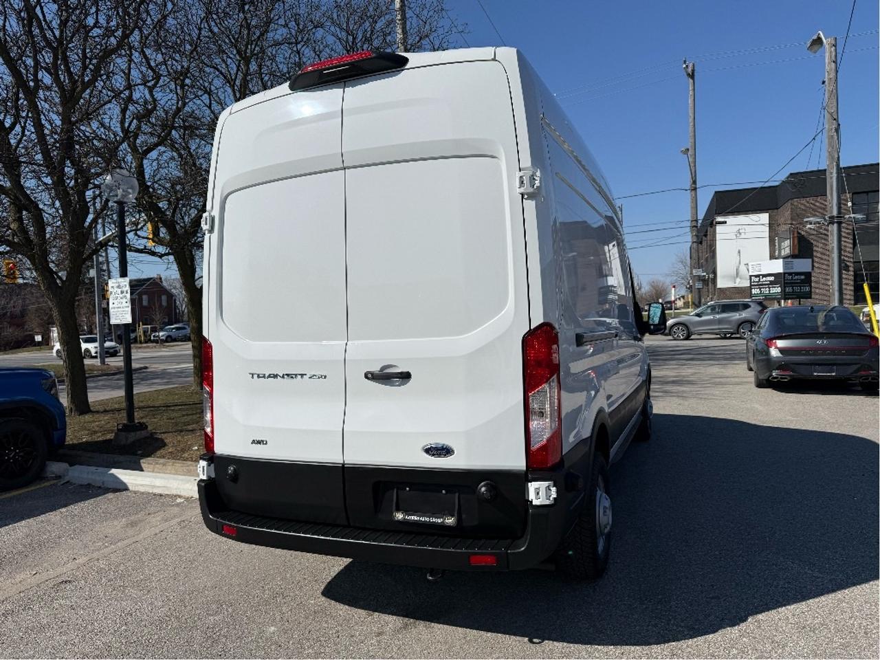 2024 Ford Transit Cargo Van AllWheelDrive T250 148 Hi Roof Warranty CleanCarfx Photo2