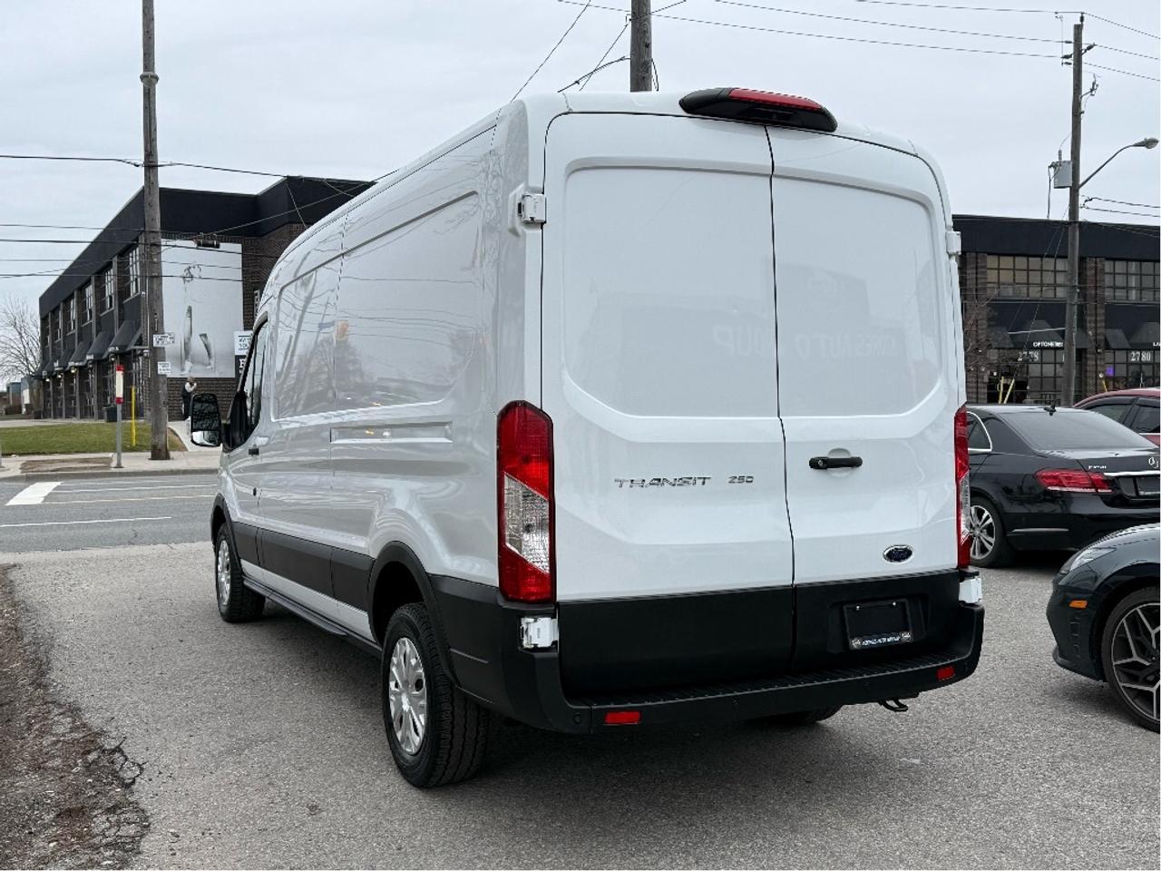 2023 Ford Transit Cargo Van T-250 148  Mid Roof Certified Warranty Navigation Photo