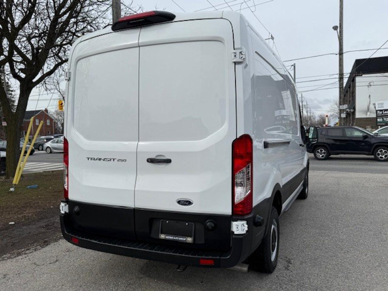2024 Ford Transit Cargo Van T250 148WheelBase MidRoof Certified Warranty LowKM Photo