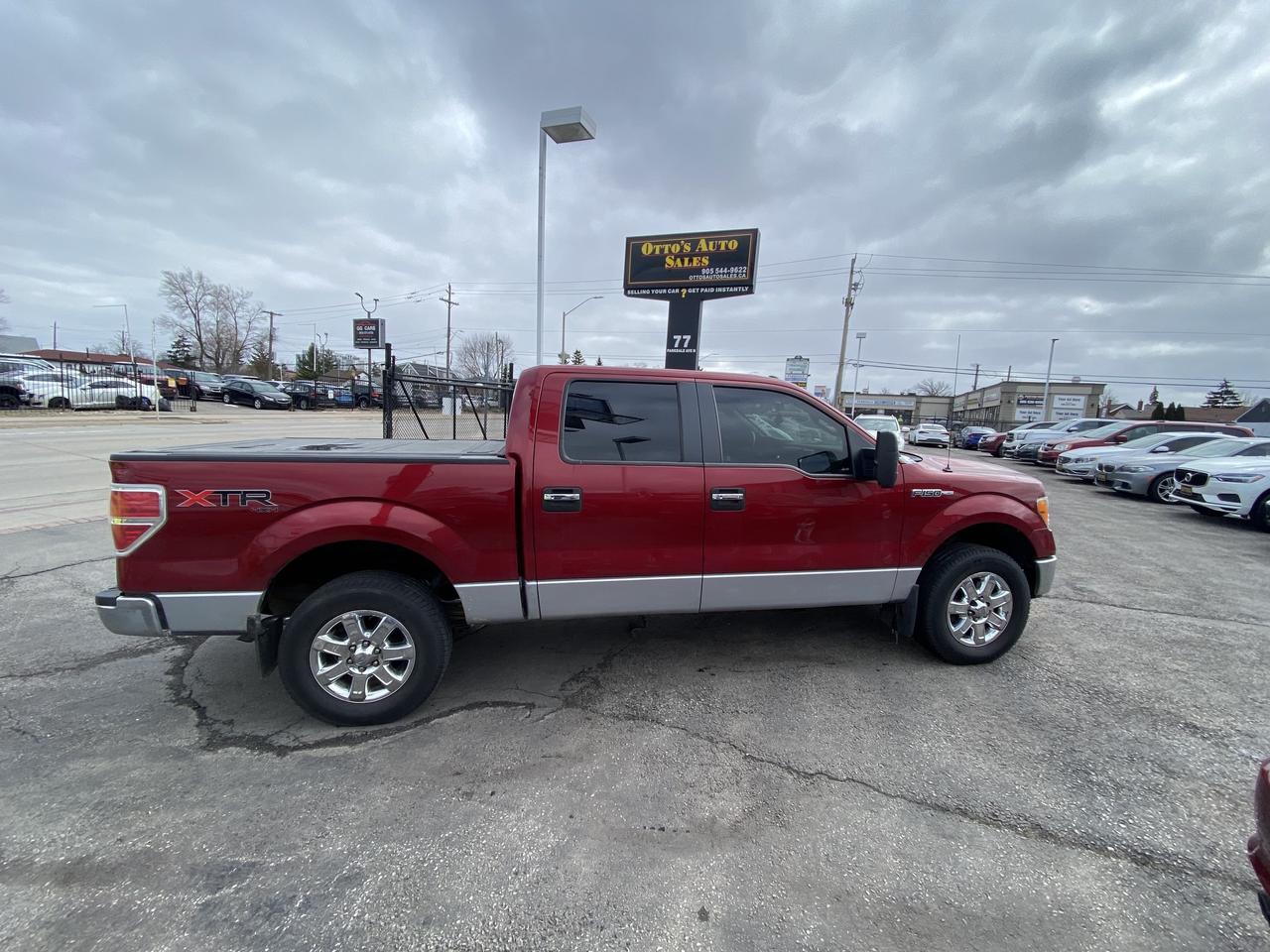 2013 Ford F-150 4WD SuperCrew 145  XLT Photo