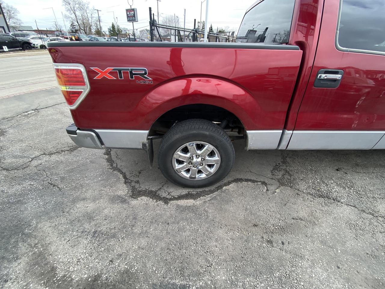 2013 Ford F-150 4WD SuperCrew 145  XLT Photo