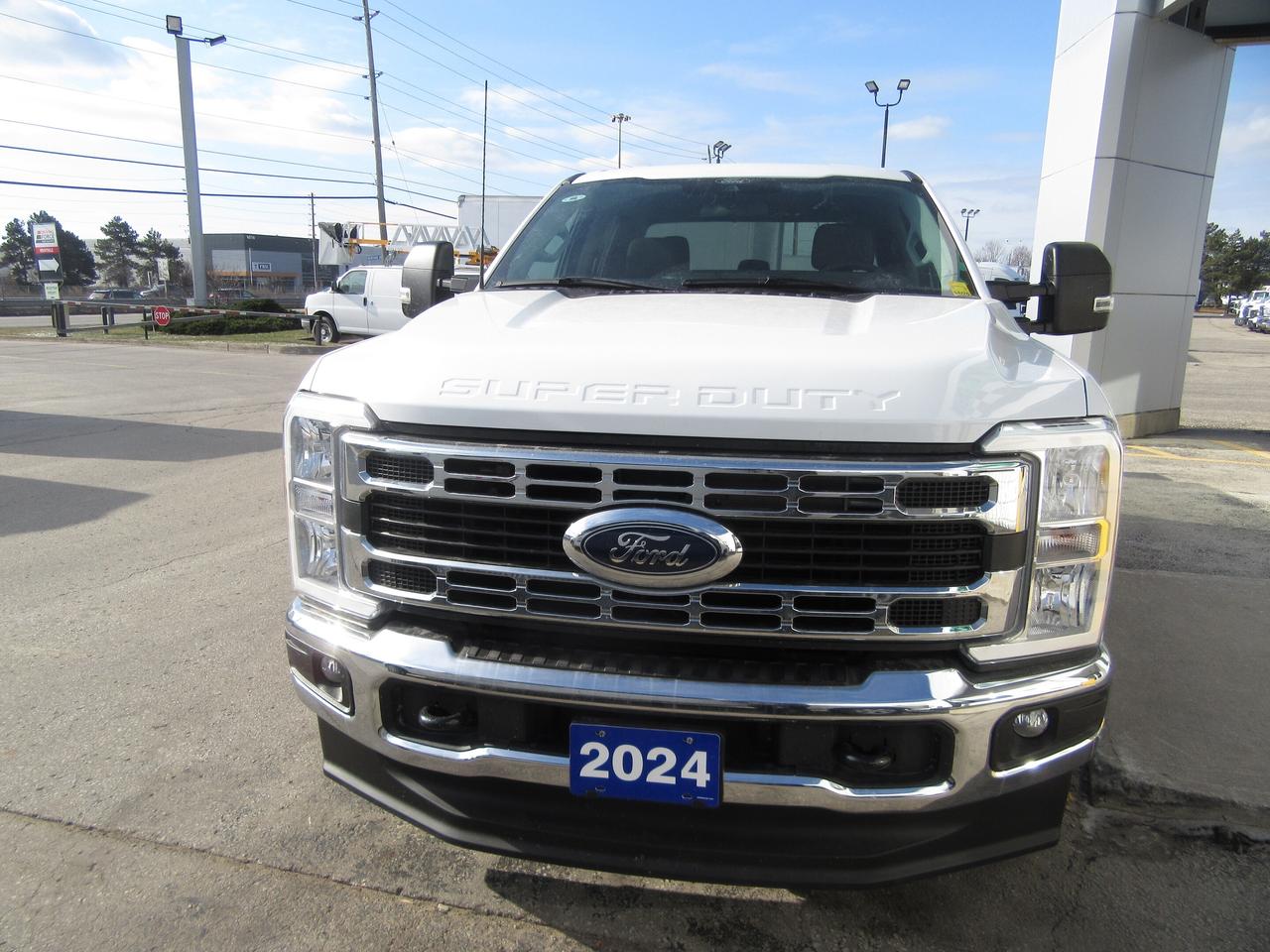 2024 Ford F-250 CREW CAB XLT 4X4 8FT LONG BOX WITH TOMMY GATE Photo