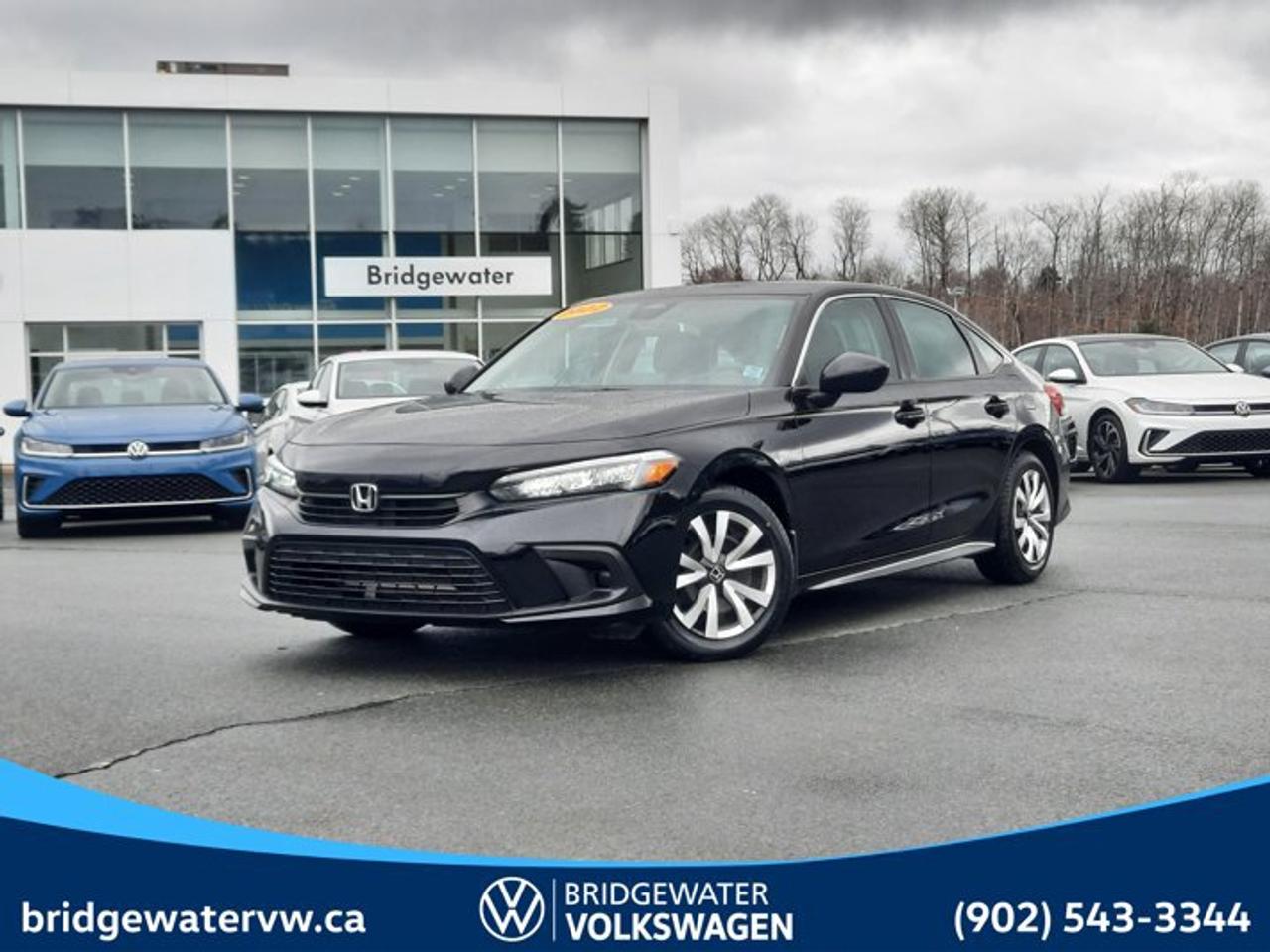 New Price! Recent Arrival! 2022 Honda Civic LXApple CarPlay | Android Auto Certified.This vehicle is a Steele Certified Pre-Owned Vehicle, offering added confidence through enhanced inspection standards and dealership-backed benefits. Steele Certified Reconditioning Process: Comprehensive multi-point inspection Mechanical and cosmetic reconditioning completed as needed Brake, tire, and battery assessment Professional detailing Final quality control road test Steele Certified Pre-Owned vehicles include additional ownership benefits. Any concerns related to the certification process must be reviewed and addressed by the original selling dealer.CARFAX Canada No Reported Accidents Odometer is 31188 kilometers below market average!Crystal Black Pearl FWD CVT 2.0L I4 DOHC 16V i-VTEC Black Cloth, 16 Steel Wheels w/Full Covers, 4-Wheel Disc Brakes, 8 Speakers, ABS brakes, Air Conditioning, AM/FM radio, Apple CarPlay/Android Auto, Auto High-beam Headlights, Automatic temperature control, Brake assist, Bumpers: body-colour, Delay-off headlights, Driver door bin, Driver vanity mirror, Dual front impact airbags, Dual front side impact airbags, Electronic Stability Control, Exterior Parking Camera Rear, Fabric Seating Surfaces, Forward collision: Collision Mitigation Braking System (CMBS) + FCW mitigation, Four wheel independent suspension, Front anti-roll bar, Front Bucket Seats, Front reading lights, Fully automatic headlights, Heated door mirrors, Heated Front Bucket Seats, Heated front seats, Illuminated entry, Knee airbag, Low tire pressure warning, Occupant sensing airbag, Outside temperature display, Overhead airbag, Panic alarm, Passenger door bin, Passenger vanity mirror, Power door mirrors, Power steering, Power windows, Radio data system, Radio: AM/FM Audio System, Rear anti-roll bar, Rear side impact airbag, Rear window defroster, Remote keyless entry, Security system, Speed control, Speed-sensing steering, Split folding rear seat, Steering wheel mounted audio controls, Tachometer, Telescoping steering wheel, Tilt steering wheel, Traction control, Trip computer, Variably intermittent wipers.