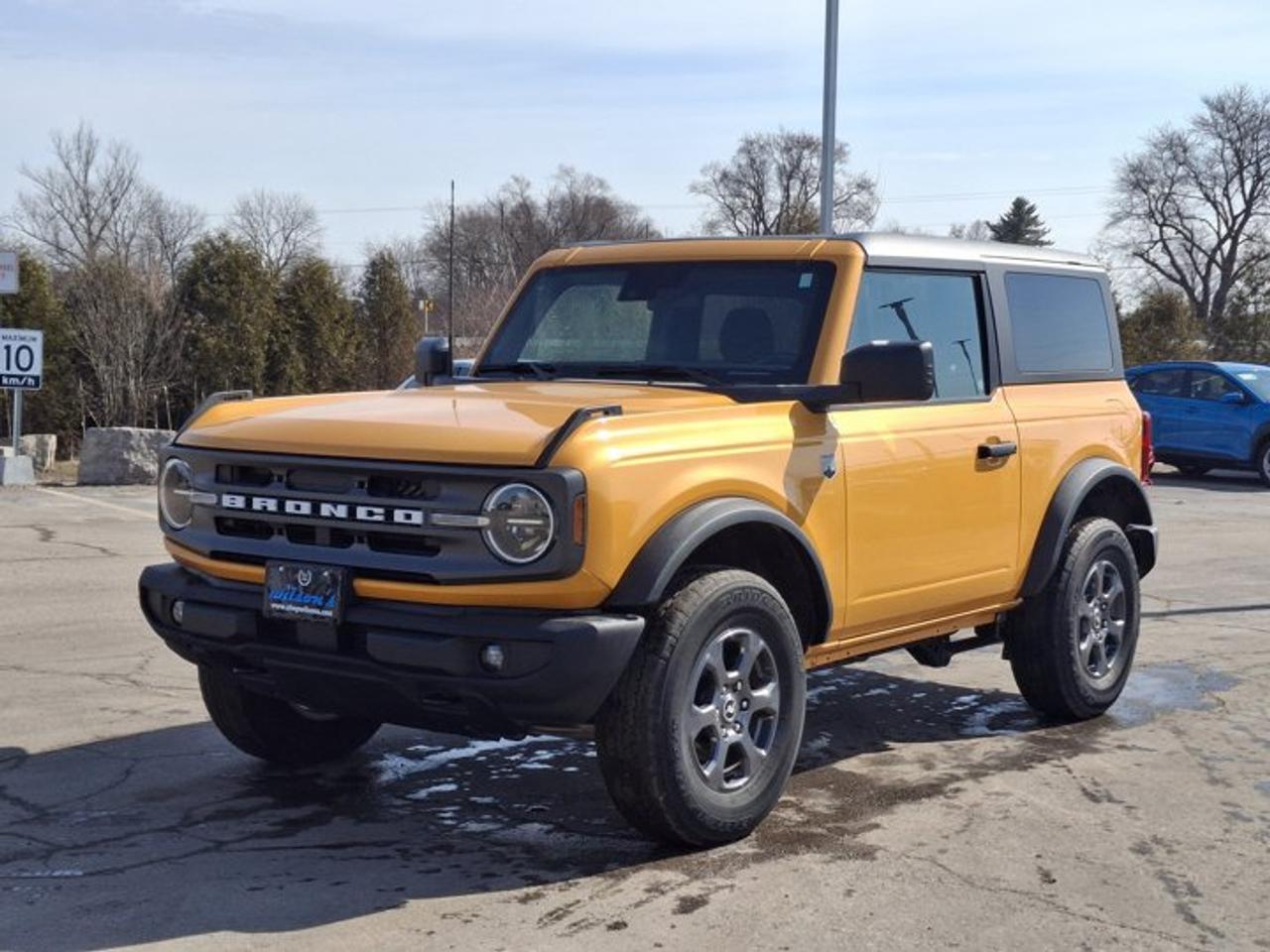 Come see this certified 2022 Ford Bronco Big Bend 2-Dr 4X4 | Cyber Orange | Hard Top | Auto | CarPlay + Android | Rear Camera | and More !. Its Automatic transmission and 2.3 L engine will keep you going. This Ford Bronco comes equipped with these options: Reverse Camera, Air Conditioning, Tilt Steering Wheel, Steering Radio Controls, Power Windows, Power Locks, Traction Control, Power Mirrors, Android Auto / Apple CarPlay, and 4X4. Stop by and visit us at Mark Wilsons Better Used Cars, 5055 Whitelaw Road, Guelph, ON N1H 6J4.MASSIVE SELECTION: 500+ vehicles in ONE LOCATION, all Live Market Priced for the best value!STRAIGHTFORWARD & TRANSPARENT PRICING: Our Advertised Price INCLUDES:Safety Certification! (No separate certification fee upcharge).FREE Carfax History Report!NO upcharge for paying cash!CONFIDENCE & PEACE OF MIND: 30-Day/3,000 km Warranty INCLUDED! Plus a 5-Day Exchange Privilege!*EASY FINANCING: Better-than-bank rates, $0 Down, and 3 Months No Payments available OAC. BAD CREDIT APPROVED HERE!WE BUY CARS: Get Top Dollar for your trade, or sell us your vehicle for CASH even if you dont buy ours!www.shopwilsons.comAn Honest, Transparent Buying Experience. Trusted in business since 1961!(Cash Prices Exclude HST and Licensing Fees only.)