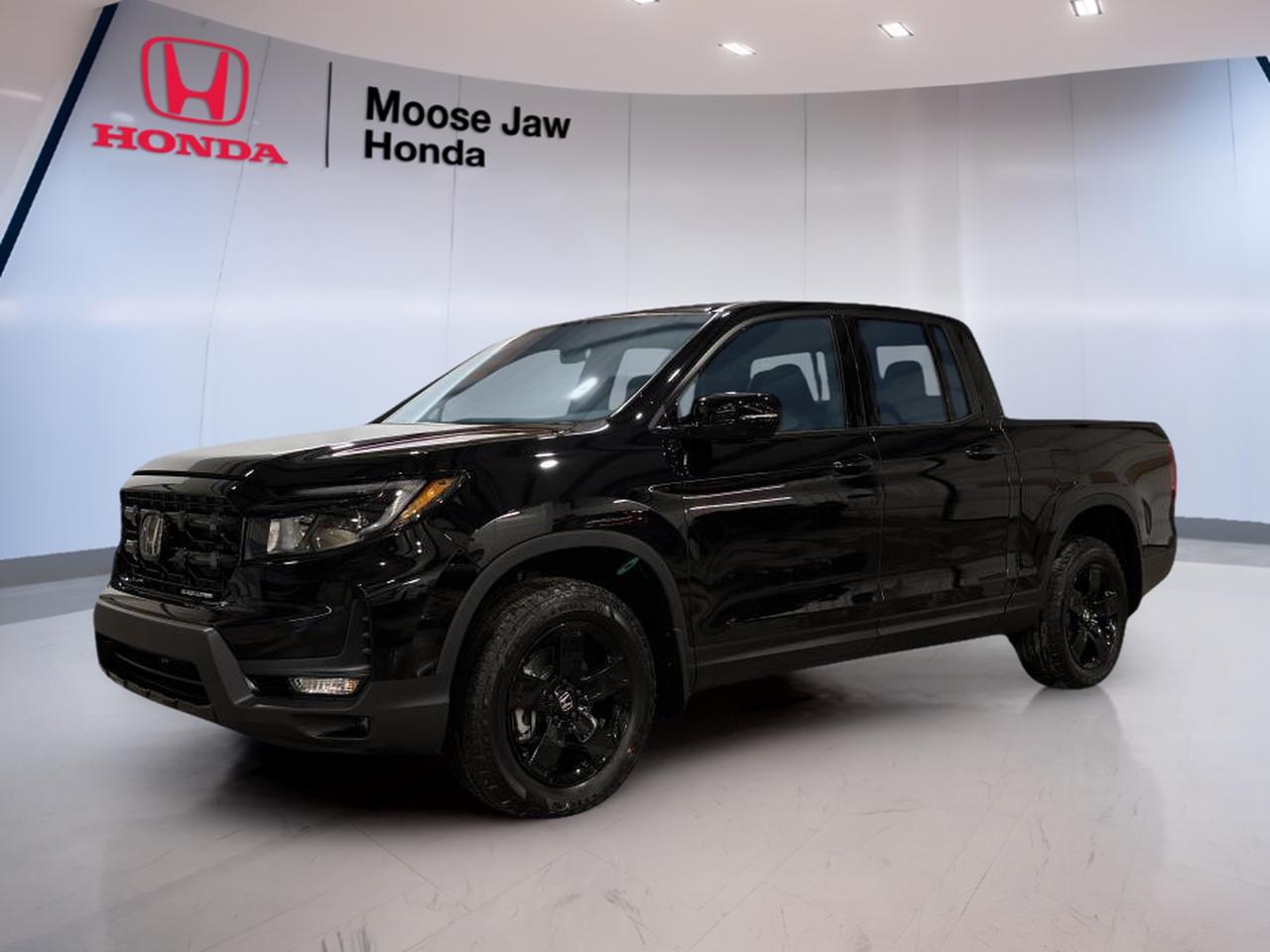 Built for work, family, and daily comfort, the 2026 Honda Ridgeline Black Edition brings smart truck design to Moose Jaw roads. This brand new pickup pairs a bold black exterior with a black interior for a clean, upscale look. With Honda engineering, all-wheel drive confidence, and a proven V6, it is ready for every season.

The 2026 Honda Ridgeline Black Edition is powered by a 3.5-litre 24-valve SOHC i-VTEC V6 engine and paired with a 9-speed automatic transmission with Shift mode. This setup delivers smooth power, easy highway cruising, and confident response in town. Intelligent all-wheel drive adds extra grip when road conditions change.

FEATURES OF THE Ridgeline Black Edition

»» Black exterior creates a bold road presence
»» Black interior delivers a clean cabin look
»» 9-speed automatic supports smooth shifting performance
»» Intelligent all-wheel drive boosts year-round confidence

TRUCK FEATURES

»» Unibody truck design supports smooth daily driving
»» All-wheel drive helps on rough surfaces
»» V6 power supports confident towing capability
»» Pickup versatility suits work and weekends

ADVANCED SAFETY FEATURES

»» Traction control helps maintain steady grip
»» All-wheel drive supports slippery road stability
»» Strong body structure enhances occupant protection
»» Honda engineering focuses on everyday confidence

PERFORMANCE AND EFFICIENCY

»» 3.5-litre V6 delivers strong smooth power
»» 9-speed automatic enables refined highway cruising
»» Intelligent all-wheel drive improves traction year-round
»» SOHC i-VTEC design supports responsive performance

COMFORT AND CONVENIENCE

»» Spacious cabin suits family and crew travel
»» Four-door layout allows easy rear access
»» Automatic transmission reduces effort in traffic
»» Black interior adds a refined atmosphere

TECHNONOLGY AND CONNECTIVITY

»» Shift mode gives added driver control
»» Clear driver layout supports easy operation
»» Modern powertrain technology improves drive response
»» Honda design keeps controls within reach

CARGO SPACE

»» Pickup bed handles gear and supplies
»» Versatile truck layout supports active lifestyles
»» Cabin space complements bed utility well
»» Practical design suits workday hauling needs

WHAT OTHER OWNERS LIKE

»» Smooth ride for a midsize truck
»» V6 power feels strong and refined
»» Comfortable cabin for daily driving
»» Useful blend of truck and SUV

This 2026 Honda Ridgeline Black Editions VIN is: 5FPYK3F89TB501056.<p> the 2026 Honda Ridgeline Black Edition brings smart truck design to Moose Jaw roads. This brand new pickup pairs a bold black exterior with a black interior for a clean</p>
<p> it is ready for every season.

The 2026 Honda Ridgeline Black Edition is powered by a 3.5-litre 24-valve SOHC i-VTEC V6 engine and paired with a 9-speed automatic transmission with Shift mode. This setup delivers smooth power</p>
<p> and confident response in town. Intelligent all-wheel drive adds extra grip when road conditions change.

FEATURES OF THE Ridgeline Black Edition

»» Black exterior creates a bold road presence
»» Black interior delivers a clean cabin look
»» 9-speed automatic supports smooth shifting performance
»» Intelligent all-wheel drive boosts year-round confidence

TRUCK FEATURES

»» Unibody truck design supports smooth daily driving
»» All-wheel drive helps on rough surfaces
»» V6 power supports confident towing capability
»» Pickup versatility suits work and weekends

ADVANCED SAFETY FEATURES

»» Traction control helps maintain steady grip
»» All-wheel drive supports slippery road stability
»» Strong body structure enhances occupant protection
»» Honda engineering focuses on everyday confidence

PERFORMANCE AND EFFICIENCY

»» 3.5-litre V6 delivers strong smooth power
»» 9-speed automatic enables refined highway cruising
»» Intelligent all-wheel drive improves traction year-round
»» SOHC i-VTEC design supports responsive performance

COMFORT AND CONVENIENCE

»» Spacious cabin suits family and crew travel
»» Four-door layout allows easy rear access
»» Automatic transmission reduces effort in traffic
»» Black interior adds a refined atmosphere

TECHNONOLGY AND CONNECTIVITY

»» Shift mode gives added driver control
»» Clear driver layout supports easy operation
»» Modern powertrain technology improves drive response
»» Honda design keeps controls within reach

CARGO SPACE

»» Pickup bed handles gear and supplies
»» Versatile truck layout supports active lifestyles
»» Cabin space complements bed utility well
»» Practical design suits workday hauling needs

WHAT OTHER OWNERS LIKE

»» Smooth ride for a midsize truck
»» V6 power feels strong and refined
»» Comfortable cabin for daily driving
»» Useful blend of truck and SUV

This 2026 Honda Ridgeline Black Editions VIN is: 5FPYK3F89TB501056.</p>
