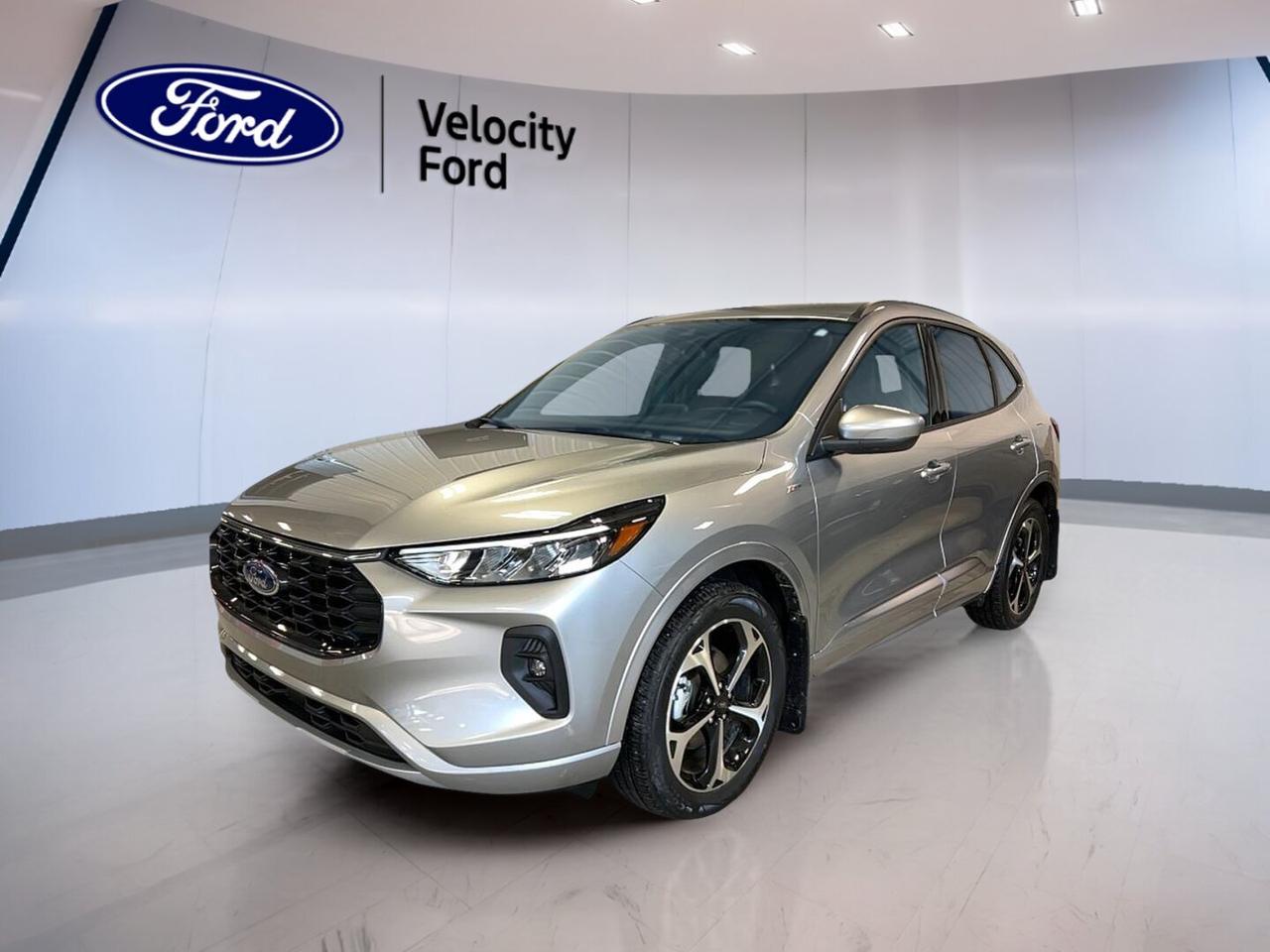 // ACCIDENT FREE!! //

This 2024 Ford Escape Hybrid ST-Line Select AWD HYBRID is a smart SUV for daily life in Moose Jaw. It is a used hybrid with only 25,175 km, a sleek Silver exterior, a Black interior, four doors, and smooth automatic operation. CARFAX Canada reports no accident, so you can shop with added peace of mind.

Built to balance fuel savings and everyday ability, this 2024 Ford Escape Hybrid ST-Line Select AWD HYBRID uses a 2.5-litre hybrid engine and all-wheel drive for confident travel in changing Prairie weather. It blends easy city manners with solid highway comfort, making it a strong fit for commuting, errands, and weekend trips.

FEATURES OF THE Escape Hybrid ST-Line Select AWD HYBRID

»» 2.5-litre hybrid engine saves more fuel
»» All-wheel drive adds year-round confidence
»» ST-Line styling brings sporty road presence
»» Automatic transmission delivers smooth daily driving

HYBRID VEHICLE FEATURES

»» Hybrid system helps reduce fuel stops
»» Gas and electric power work smoothly
»» Quiet low-speed operation feels refined daily
»» Great choice for efficient SUV driving

ADVANCED SAFETY FEATURES

»» Backup camera helps with safer reversing
»» Blind spot monitor supports lane awareness
»» Lane departure warning adds extra confidence
»» Multiple airbags help protect occupants

PERFORMANCE AND EFFICIENCY

»» 2.5-litre hybrid powertrain balances performance well
»» Automatic transmission shifts with smooth response
»» All-wheel drive improves traction in weather
»» Cruise control supports relaxed highway travel

COMFORT AND CONVENIENCE

»» Heated front seats add cold-weather comfort
»» Dual-zone climate control helps cabin comfort
»» Remote starter warms vehicle before driving
»» Power liftgate helps with daily loading

TECHNONOLGY AND CONNECTIVITY

»» Bluetooth integration supports hands-free phone use
»» WiFi hotspot keeps passengers better connected
»» Steering wheel audio controls feel convenient
»» Satellite radio expands entertainment choices

CARGO SPACE

»» Rear trunk access makes loading easier
»» Power liftgate adds everyday convenience
»» Four-door design supports family-friendly practicality
»» Flexible SUV space suits busy lifestyles

WHAT OTHER OWNERS LIKE

»» Excellent fuel economy from hybrid system
»» Comfortable ride for daily commuting
»» Useful cargo room for family needs
»» Easy technology and simple controls

At Velocity Ford, this hybrid SUV stands out for the value it brings to every drive. The 2024 Ford Escape Hybrid ST-Line Select AWD HYBRID gives you efficient hybrid performance, practical comfort, and useful safety technology in one well-rounded package. It is ready to make each trip easier, quieter, and more economical.

Finished in Silver with a Black interior, this hybrid SUV also includes heated mirrors, power windows, power steering, anti-lock braking system, stability control, child safety locks, fog lights, LED headlamps, tinted windows, push button start, and a driver power seat with lumbar support. It is a practical and efficient choice for modern driving.

This 2024 Ford Escape Hybrid ST-Line Select AWD HYBRIDs VIN is: 1FMCU9NZ4RUB37280.