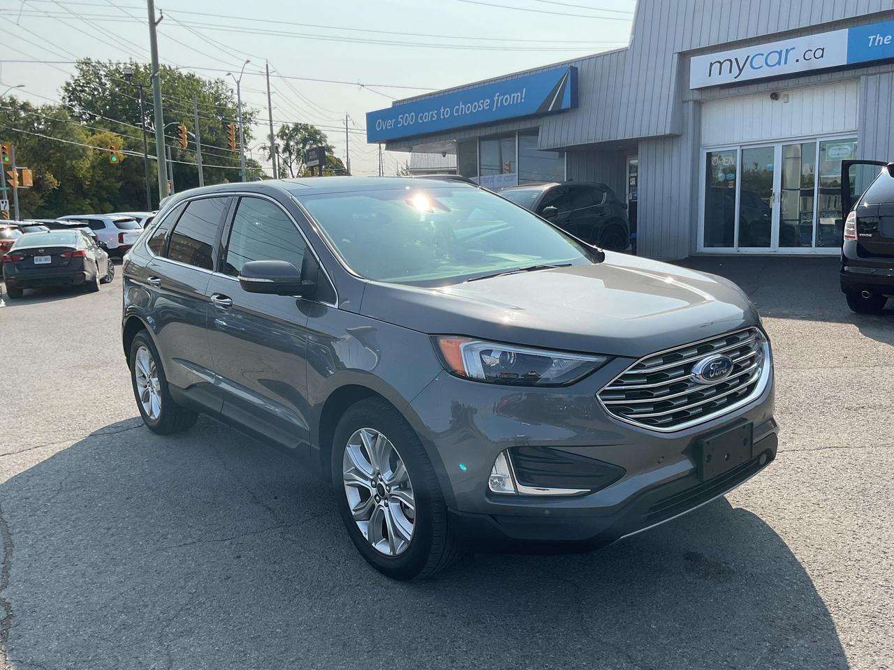 ???? 2L TITANIUM AWD  FORD EDGE TITANIUM 2023  Adventure-ready luxury! ????<br><br>

This stunning Ford Edge Titanium AWD delivers premium comfort, cutting-edge technology, and all-weather capability. Perfect for you and your lifestyle!<br><br>

Features youll love:<br>
? 2L Titanium AWD<br>
? Sunroof<br>
? Heated Seats<br>
? Leather Interior<br>
? Navigation System<br>
? Backup Camera<br>
? Smart Device Integration<br>
? Air Conditioning<br>
? Cruise Control<br>
? Full Power Group<br><br>

?? NO FEES! <span>(Just pay applicable taxes.)</span><br>
?? LOWEST PRICE GUARANTEED!<br><br>

?? 4 LOCATIONS TO SERVE YOU BETTER:<br>
?? RICHMOND: 1-888-416-2199<br>
?? OTTAWA: (343) 429-6444<br>
?? KINGSTON: 1-888-508-3494<br>
?? NORTH BAY: 1-888-282-3560<br><br>

?? Visit <strong>WWW.MYCAR.CA</strong> to see this FORD EDGE and more!<br>
?? Confidence, comfort, and value  all in one! ??