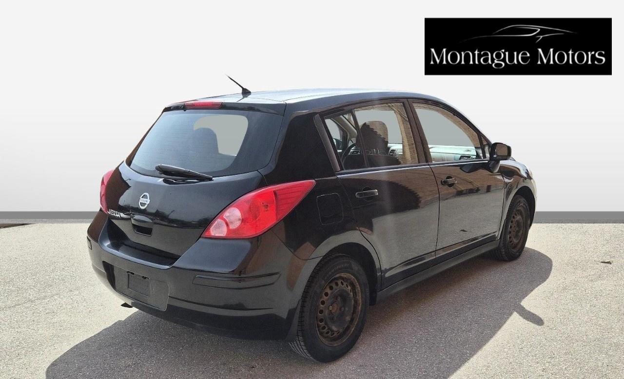 2011 Nissan Versa 5dr HB I4 Auto 1.8 S Photo