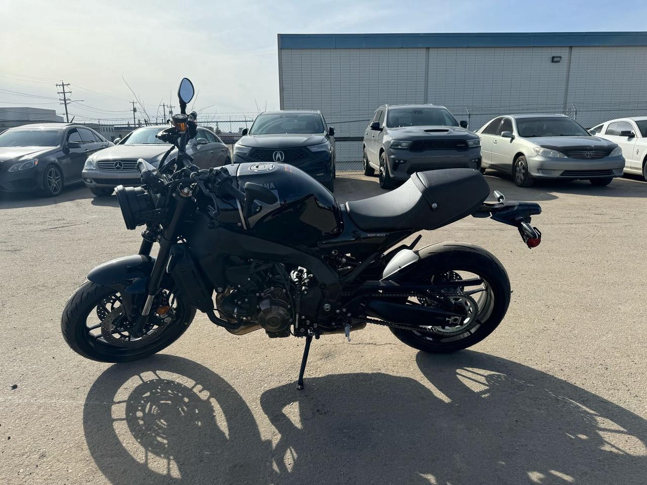 <p data-start=0 data-end=403>Engineered to capture the spirit of classic design while delivering uncompromising modern performance, the 2025 Yamaha XSR900 is a neo-retro sportbike built for the thrill-seeker. Powered by a robust 890cc CP3 inline three-cylinder engine, this masterpiece delivers instantaneous throttle response and muscular torque, ensuring every twist of the throttle ignites your passion for the open road.</p><p data-start=0 data-end=403>&nbsp;</p><p data-start=405 data-end=800>Outfitted with advanced rider aids like a ride-by-wire throttle system, quickshifter, lean-sensitive traction control, and cornering ABS, the XSR900 is meticulously crafted to offer precision handling and confidence on every bend and straightaway. Its lightweight chassis and razor-sharp electronics combine to provide a ride thats as dynamic on urban streets as it is on winding backroads.</p><p data-start=405 data-end=800>&nbsp;</p><p data-start=802 data-end=1109>Harmonizing retro-inspired aesthetics with state-of-the-art engineering, the XSR900 boasts a sculpted fuel tank, a distinctive round LED headlight, and minimalist yet bold detailing that speaks to Yamaha&rsquo;s racing legacy. Every element is designed to evoke the classics while embracing tomorrow&rsquo;s technology.</p><p data-start=1111 data-end=1285>&nbsp;</p><p data-start=0 data-end=346>&nbsp;</p><p data-start=1287 data-end=1417>Contact us now to check availability, inquire about financing options, and enjoy fast, hassle-free delivery across the Canada!</p>