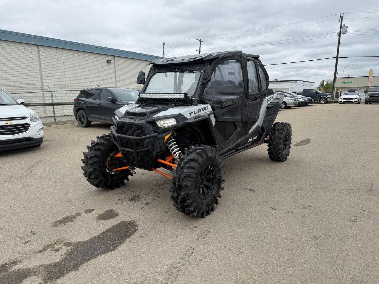 <p data-start=165 data-end=470>The 2018 Polaris RZR XP 4 Turbo is built for thrill-seekers who want to bring the whole crew along for the ride. With seating for four and a high-output 168 HP ProStar Turbo H.O. engine, this side-by-side delivers adrenaline-packed performance, precision handling, and extreme off-road capability.</p><p data-start=165 data-end=470>&nbsp;</p><p data-start=472 data-end=902>Engineered for desert runs, dune climbs, and trail domination, the XP 4 Turbo features Walker Evans needle shocks and a suspension system with 21 inches of travel, offering a smooth, stable ride even through the roughest terrain. The 64-inch stance and long wheelbase provide added comfort and control, while the high-clearance A-arms and 29-inch Maxxis Bighorn tires help you confidently tackle rocks, ruts, and sand.</p><p data-start=472 data-end=902>&nbsp;</p><p data-start=904 data-end=1114>The RZR XP 4 Turbo isn&rsquo;t just fast &mdash; it&rsquo;s smart. With on-demand all-wheel drive, electronic power steering, and an aggressive, race-inspired design, it delivers both confidence and comfort at any speed.</p><p data-start=1116 data-end=1311>&nbsp;</p><p data-start=99 data-end=456>&nbsp;</p><p data-start=1313 data-end=1452>Reach out today for pricing, financing options, and fast delivery anywhere in Canada. Performance, space, and power &mdash; all in one package.</p>