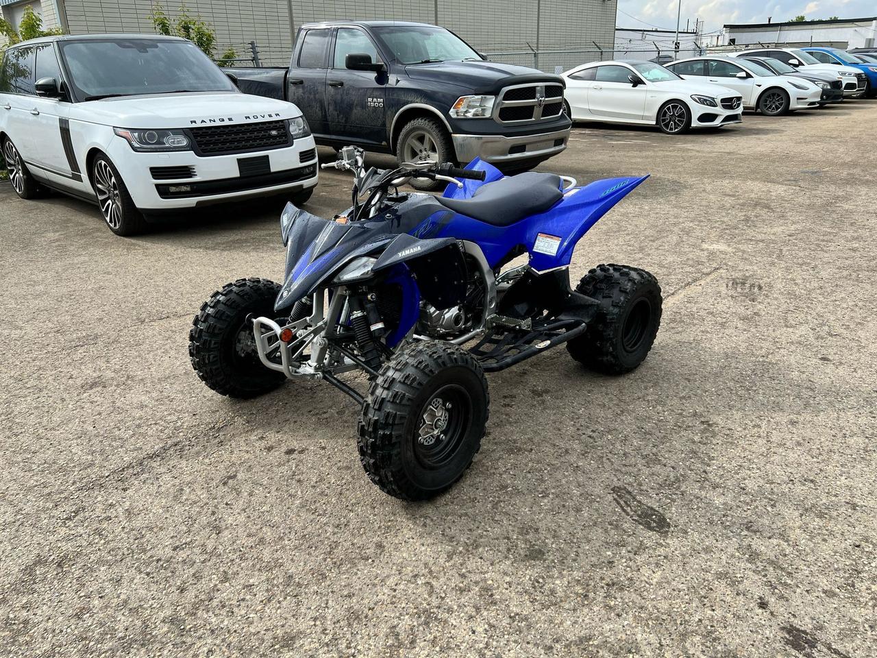 <p data-start=239 data-end=534>Engineered for riders who crave dominance on the track and the trail, the 2024 Yamaha YFZ450R continues its legacy as the premier high-performance sport ATV. With championship-winning DNA and factory-built race readiness, this machine is built to conquer podiums&mdash;and every corner in between.</p><p data-start=239 data-end=534>&nbsp;</p><p data-start=536 data-end=895>At the core is a potent 449cc fuel-injected, liquid-cooled engine with titanium five-valve technology, delivering instant throttle response and blistering acceleration. Matched with a close-ratio five-speed transmission and lightweight forged piston, the 2024 YFZ450R offers raw power and razor-sharp responsiveness that serious riders demand.</p><p data-start=536 data-end=895>&nbsp;</p><p data-start=897 data-end=1234>The motocross-inspired chassis features a hybrid aluminum/steel frame for optimal strength-to-weight balance, along with wide A-arms and long-travel fully adjustable suspension for maximum control over jumps, whoops, and tight terrain. A low center of gravity ensures aggressive cornering with confidence-inspiring stability.</p><p data-start=897 data-end=1234>&nbsp;</p><p data-start=1236 data-end=1456>Push harder. Ride faster. Go further.<br data-start=1504 data-end=1507>The 2024 YFZ450R is your gateway to the ultimate in sport ATV performance.</p><p data-start=190 data-end=507>&nbsp;</p><p data-start=1587 data-end=1667>Contact us today for flexible financing options and nationwide delivery.</p>