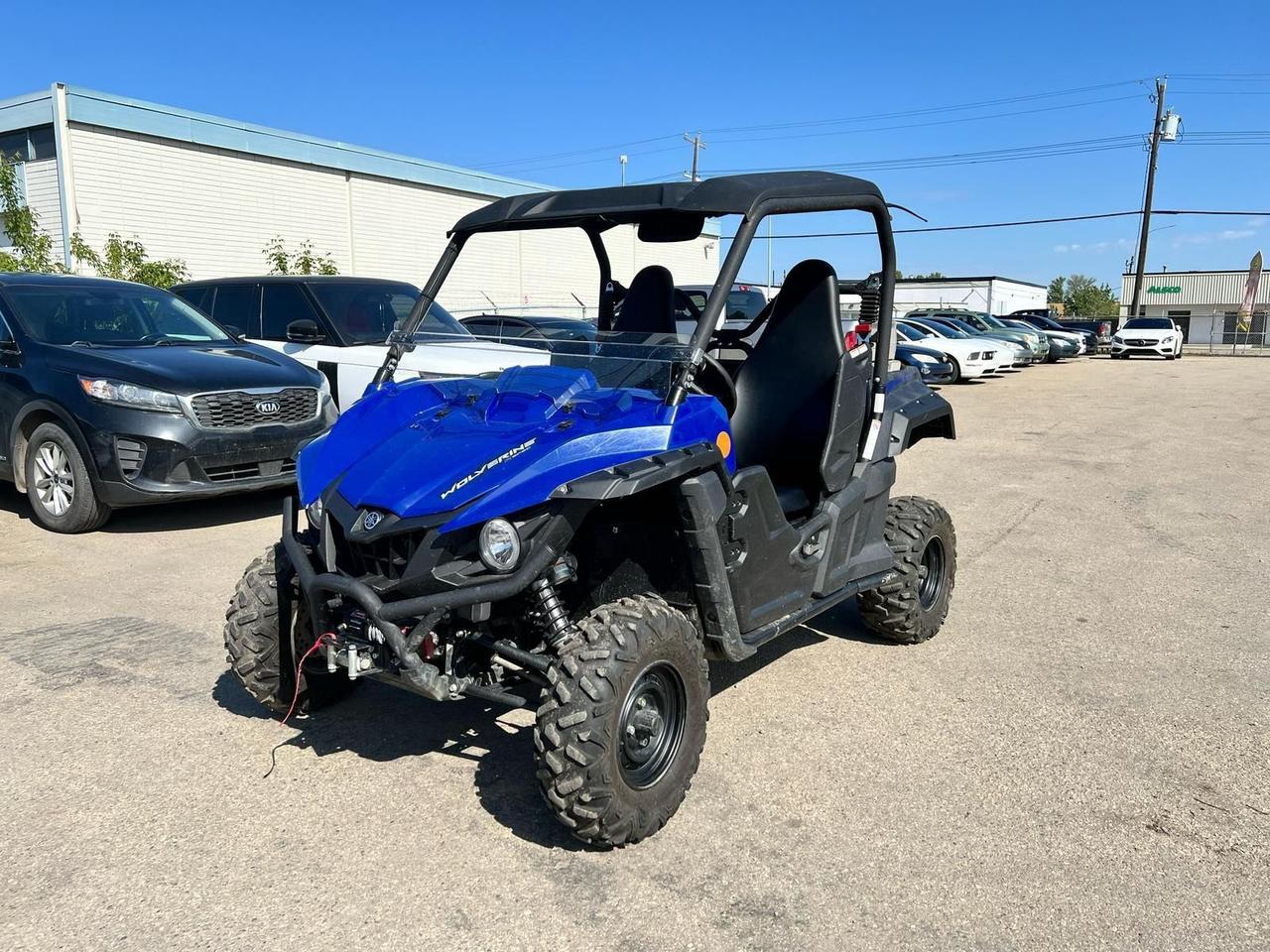 <p data-start=134 data-end=536>The 2016 Yamaha Wolverine is a tough, trail-ready side-by-side built for riders who want reliable performance, nimble handling, and off-road versatility in a compact, confident package. Powered by a 708cc fuel-injected single-cylinder engine, the Wolverine delivers smooth, torquey power &mdash; perfect for navigating tight trails, climbing rocky paths, or getting the job done around your property.</p><p data-start=134 data-end=536>&nbsp;</p><p data-start=538 data-end=856>This model features Yamaha&rsquo;s Ultramatic&reg; CVT transmission, with engine braking and on-command 2WD/4WD for total control in changing conditions. Its compact 59-inch width makes it ideal for narrow trails, while the fully independent suspension with long travel soaks up rough terrain for a comfortable ride.</p><p data-start=538 data-end=856>&nbsp;</p><p data-start=858 data-end=1157>The Wolverine also comes equipped with high-back bucket seats, full underbody skid plates, and a durable steel cargo bed for gear, tools, or hunting supplies. Its tough build, sharp styling, and Yamaha reliability make it a smart choice for riders who want capability without compromise.</p><p data-start=133 data-end=483>&nbsp;</p><p data-start=1159 data-end=1320>Reach out now for current pricing, financing options, or delivery anywhere in Canada. The 2016 Yamaha Wolverine &mdash; compact, capable, and ready to explore.</p>