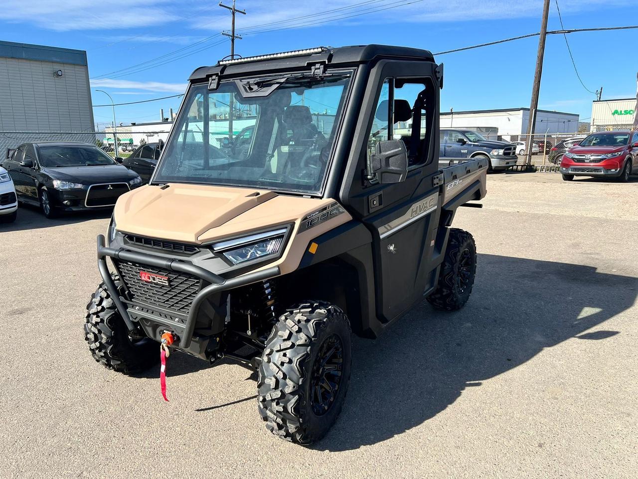 <p data-start=152 data-end=466>The 2025 AODES Workcross HVAC 1000 is built for year-round performance, combining powerful utility with all-season comfort in a climate-controlled cab. Powered by a 963cc liquid-cooled, fuel-injected engine, this side-by-side delivers dependable power and torque to handle demanding jobs and off-road adventures.</p><p data-start=152 data-end=466>&nbsp;</p><p data-start=468 data-end=832>Purpose-built for versatility, the Workcross HVAC 1000 features an automatic CVT transmission, selectable 2WD/4WD with differential lock, and electronic power steering for precise control in tough conditions. The fully enclosed cab comes equipped with heating and air conditioning, keeping you comfortable whether it&rsquo;s the peak of summer or the middle of winter.</p><p data-start=468 data-end=832>&nbsp;</p><p data-start=834 data-end=1135>With aggressive off-road tires on 14&rdquo; aluminum wheels and 12.5&rdquo; of ground clearance, this machine is ready for mud, snow, and rocky trails. Independent suspension with dual A-arms ensures stability and a smooth ride, while the reinforced frame provides long-lasting durability under heavy workloads.</p><p data-start=834 data-end=1135>&nbsp;</p><p data-start=1137 data-end=1457>This 3-seater also comes equipped with a dumping cargo box, a 3,500-lb winch, full doors with glass windows, roof-mounted LED light bar, and heavy-duty bumpers. Inside, you&rsquo;ll find comfortable seating, a digital gauge display, multiple storage compartments, and a cab designed for all-day productivity and convenience.</p><p data-start=148 data-end=459>&nbsp;</p><p data-start=1459 data-end=1554 data-is-last-node= data-is-only-node=>Call or message us today to learn more about financing, trade-ins, or delivery across Canada.</p>