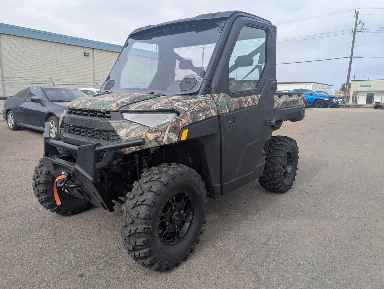 <p data-start=74 data-end=411>The 2024 Polaris Ranger XP 1000 Premium is built for ultimate utility and off-road performance, delivering the perfect combination of power, comfort, and versatility. Equipped with the ProStar 1000 engine, this Ranger provides smooth throttle response, strong torque, and dependable performance in any terrain.</p><p data-start=74 data-end=411>&nbsp;</p><p data-start=413 data-end=755>Designed for rugged work and recreational use, the Ranger XP 1000 Premium features a durable chassis with advanced suspension, ensuring a stable and controlled ride even on rough trails. With heavy-duty shocks and adjustable rear suspension, it offers superior handling, whether carrying heavy loads, towing, or navigating technical trails.</p><p data-start=413 data-end=755>&nbsp;</p><p data-start=757 data-end=1172>The hard enclosed cab provides year-round protection from the elements, while the integrated winch expands functionality for trail recovery or worksite tasks. Its robust cargo box and towing capacity make this Ranger a reliable partner for both work and play. The comfortable, ergonomic interior includes seating for two, intuitive controls, and a clear digital display for easy monitoring of vehicle performance.</p><p data-start=757 data-end=1172>&nbsp;</p><p data-start=1174 data-end=1460>This unit also comes with premium styling, LED lighting, and reinforced bodywork for durability in demanding conditions. Inside, the spacious, weather-protected cockpit ensures comfort during long rides, while the rugged exterior design enhances its presence on any trail or worksite.</p><p data-start=152 data-end=466>&nbsp;</p><p data-start=1462 data-end=1549>Contact us today to learn more about financing, trade-ins, or delivery across Canada.</p>
