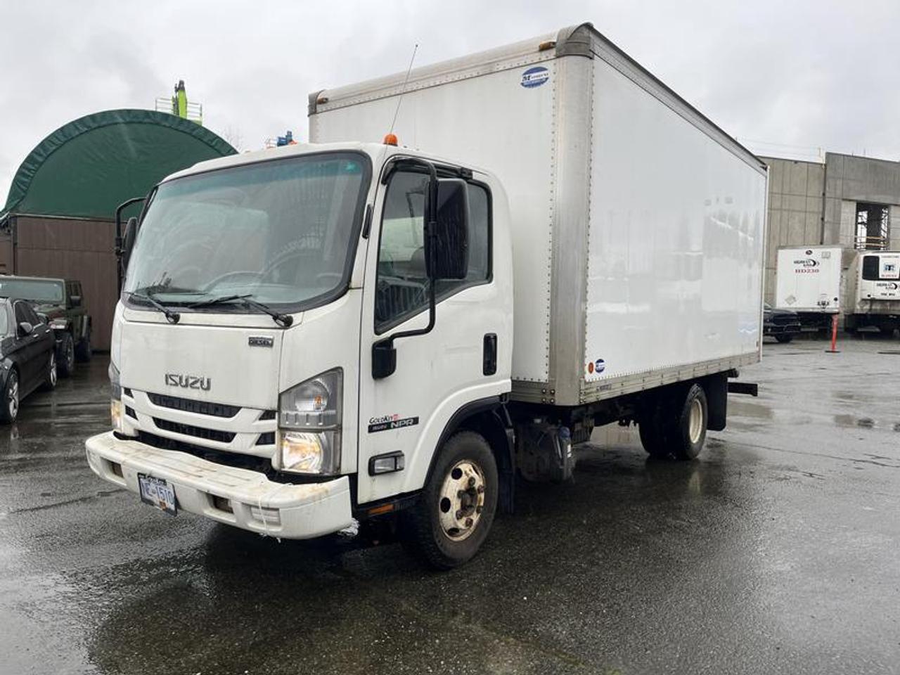 2016 Isuzu NPR 16 Foot Cube Van Diesel With Ramp, 2 door, automatic, 4X2, white exterior, grey interior, cloth. Measurements: Length 16 Foot, Width 7.8 foot, Height 7 Foot, Door Clearance 6.2 Foot. (All the measurements are deemed to be true but are not guaranteed).(engine Light on)  $18,500.00 plus $375 processing fee, $18,875.00 total payment obligation before taxes.  Listing report, warranty, contract commitment cancellation fee, financing available on approved credit (some limitations and exceptions may apply). All above specifications and information is considered to be accurate but is not guaranteed and no opinion or advice is given as to whether this item should be purchased. We do not allow test drives due to theft, fraud, acts of vandalism and undetectable impaired driving. Instead we provide the following benefits: Complimentary Warranty (with options to extend), Limited Money Back Satisfaction Guarantee on Fully Completed Contracts, Contract Commitment Cancellation, and an Open-Ended Sell-Back Option. Ask seller for details or call 604-522-REPO(7376) to confirm listing availability.