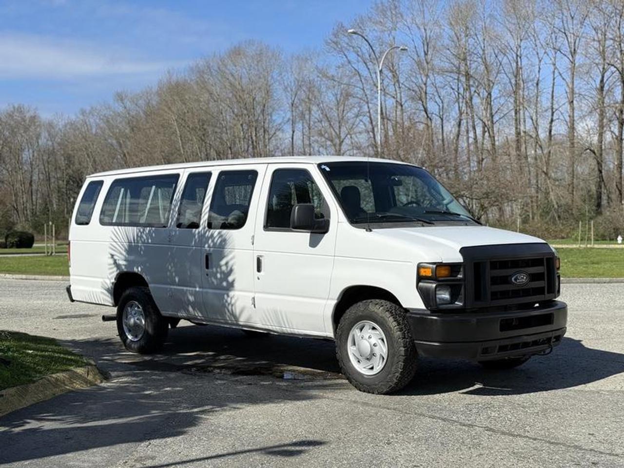 This 2009 Ford Econoline E-350 Extended passenger van is powered by a 5.4L V8 paired with an automatic transmission and rear-wheel drive, and is configured to carry 11 passengers. It features cruise control, air conditioning with front and rear climate control, AM/FM radio with CD player, and power windows, power door locks, and power mirrors. Finished in white with a grey cloth interior and a three-door configuration, this van offers a practical and straightforward setup suitable for group, shuttle, or passenger transportation use.  $24,830.00 plus $375 processing fee, $25,205.00 total payment obligation before taxes.  Listing report, warranty, contract commitment cancellation fee, financing available on approved credit (some limitations and exceptions may apply). All above specifications and information is considered to be accurate but is not guaranteed and no opinion or advice is given as to whether this item should be purchased. We do not allow test drives due to theft, fraud, acts of vandalism and undetectable impaired driving. Instead we provide the following benefits: Complimentary Warranty (with options to extend), Limited Money Back Satisfaction Guarantee on Fully Completed Contracts, Contract Commitment Cancellation, and an Open-Ended Sell-Back Option. Ask seller for details or call 604-522-REPO(7376) to confirm listing availability.