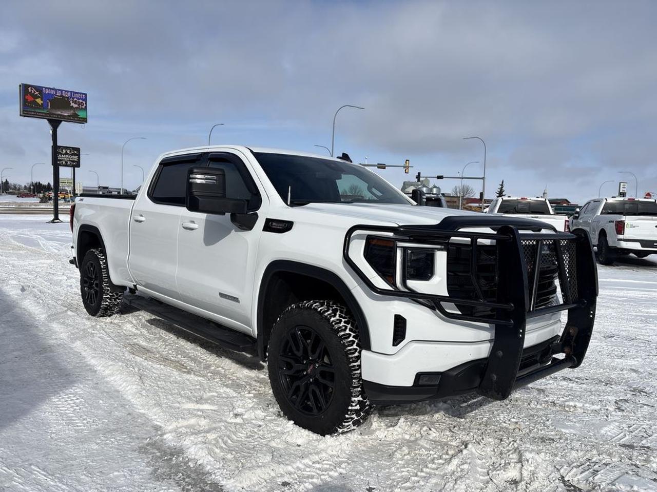 THE PRICE YOU SEE, PLUS GST. GUARANTEED!APPLE CARPLAY/ANDROID AUTO COMPATABLE! 3.0 LITER TURBOCHARGED I-6 DURAMAX DIESEL, 10 SPEED AUTO, ELEVATION TRIM, 10 WAY POWER DRIVER SEAT, 4 WAY MANUAL PASSENGER SEAT, HEATED FRONT SEATS, HEATED STEERING WHEEL, 12.3 DRIVER INFORMATION SCREEN, LED HEADLAMPS/TAILLAMPS/FOG LAMPS, 6.5 BOX,       The 2023 GMC Sierra 1500 Elevation trim equipped with the 3.0-liter Duramax Diesel engine offers a compelling combination of performance, efficiency, and rugged styling. This turbocharged inline-six diesel engine is designed to deliver impressive torque and towing capacity, making it ideal for heavy-duty tasks and hauling. It produces around 277 horsepower and a robust 460 lb-ft of torque, providing strong acceleration and excellent low-end power. The Duramax Diesel is also known for its fuel efficiency compared to traditional gasoline engines, helping owners save on fuel costs during long drives or work-related activities. The Elevation trim enhances the Sierras bold appearance with sleek black accents, 20-inch machined aluminum wheels, and monochromatic exterior details. Inside, it offers a comfortable cabin with advanced technology features such as a large infotainment touchscreen, smartphone integration, and driver-assistance systems. Overall, the 2023 GMC Sierra 1500 Elevation with the 3.0-liter Duramax Diesel combines rugged capability with modern comfort and efficiency, making it a popular choice among truck enthusiasts and professionals alike.Do you want to know more about this vehicle, CALL, CLICK OR COME ON IN!*AMVIC Licensed Dealer; CarFax and Full Mechanical Inspection Included.