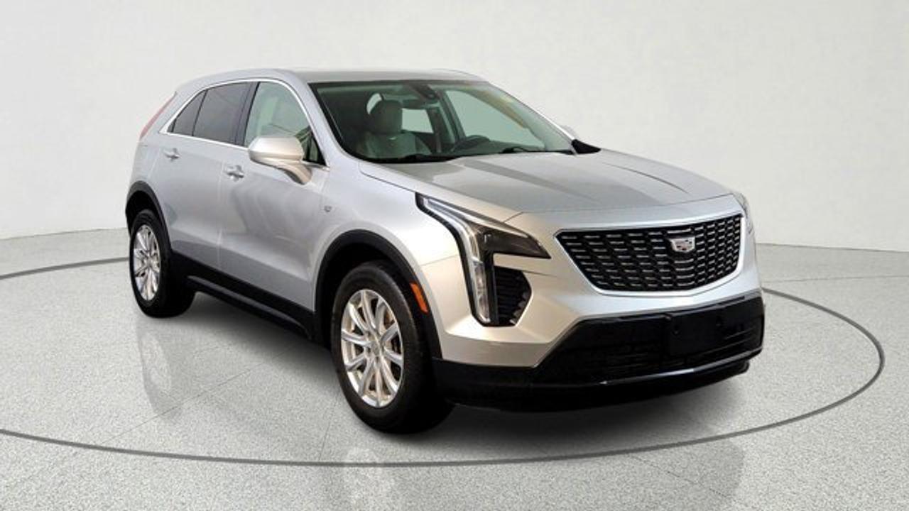 The 2019 Cadillac XT4 AWD Luxury is a compact luxury SUV that pairs a turbocharged 2.0-liter four-cylinder engine with a nine-speed automatic transmission and all-wheel drive for confident performance. Its cabin seats five and offers a well-appointed interior with an 8-inch touchscreen CUE infotainment system with Apple CarPlay/Android Auto, dual-zone automatic climate control, and power-adjustable seats for everyday comfort. The XT4 also comes with a suite of standard and available safety features like blind-spot monitoring, rear cross-traffic alert, and lane-change alert to enhance driver confidence.