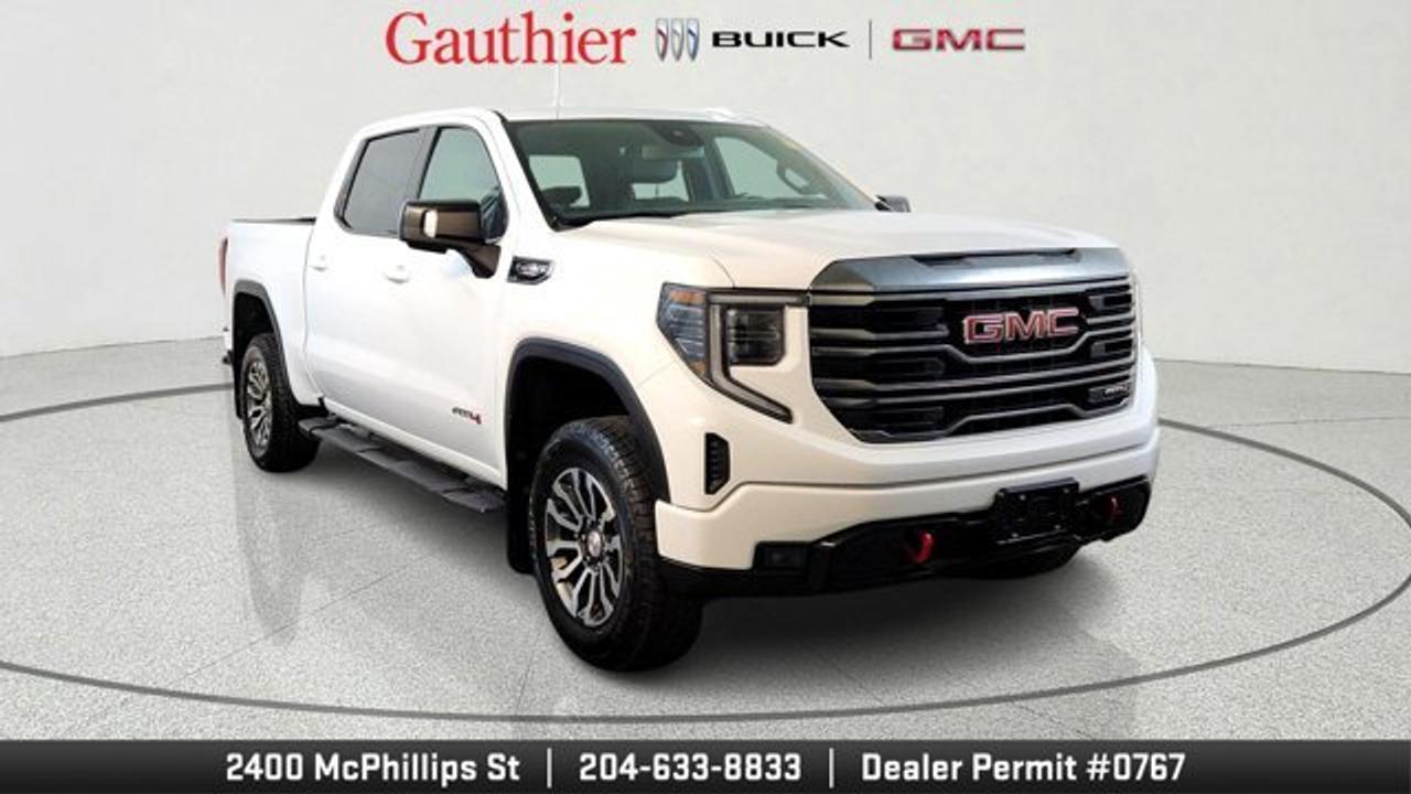 The 2022 GMC Sierra 1500 AT4 is a rugged full-size pickup designed for off-road capability, equipped with a torque-rich 3.0-liter Duramax diesel, paired with a 10-speed automatic transmission and four-wheel drive. It features specialized off-road hardware such as a factory 2-inch suspension lift, skid plates, all-terrain tires, hill descent control and an advanced trailering system, making it well-suited for both tough terrain and towing needs. Inside, the AT4 offers a comfortable and tech-focused cabin with an 8-inch touchscreen infotainment system, wireless Apple CarPlay and Android Auto, heated seats, dual-zone climate control, and a range of driver-assistance features for added safety and convenience.