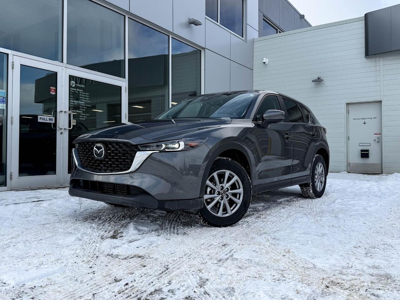 Discover the perfect balance of style, comfort, and advanced technology with this pre-owned 2025 Mazda CX-5 GS AWD in sleek Gray. Featuring a responsive 6-speed automatic transmission and all-wheel drive for confident handling in all conditions, this CX-5 offers driver-selectable modes tailored to your driving preferences. Enjoy premium touches like leather front and rear upholstery, heated seats, a leather-wrapped heated steering wheel, dual-zone automatic climate control, and a 10.2-inch infotainment display with wireless audio streaming. Safety is paramount with lane departure prevention, blind spot warning, forward collision mitigation, and a rear backup camera. With spacious seating for five, multiple USB ports, and power liftgate access, this CX-5 GS AWD is ready to elevate your daily drive. Come test drive it today at Go Mazda and experience Mazdas blend of performance, luxury, and safety firsthand!Go Mazda is an AMVIC licensed business.This vehicle was previously used as a Rental.