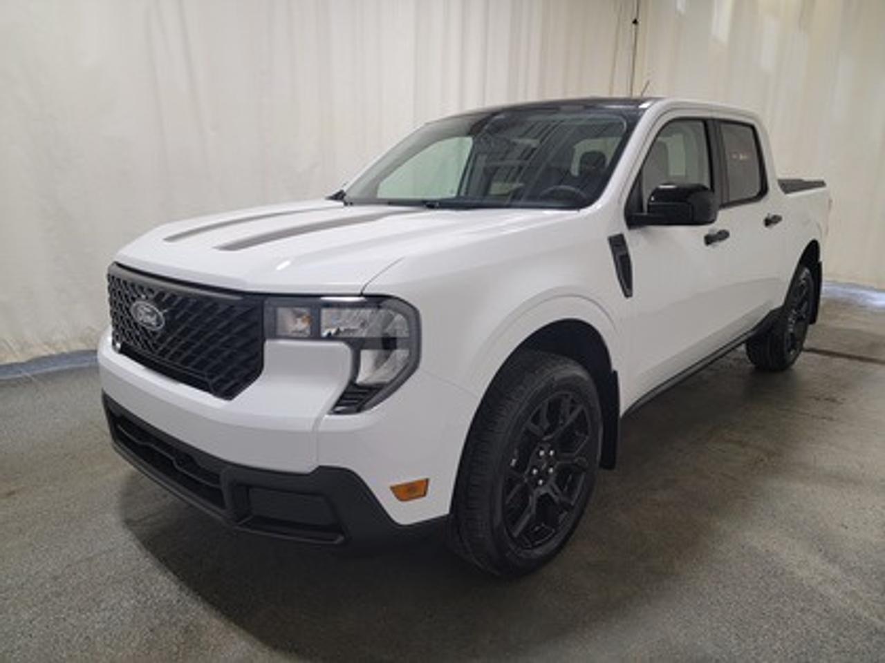 This 2026 Ford Maverick XLT 301A stands out in Oxford White, combining the versatility of a pickup with the efficiency and convenience of a compact truck. Equipped with the 2.5L Hybrid engine this truck delivers 191 horsepower and 155 lb-ft of torque, with a 94-kW electric motor paired with a CVT transmission for smooth performance and an estimated 6.4L/100 km (44 miles per gallon) combined fuel economy.

Key Features:
Tire Inflator and Sealant Kit
FordPass Connectivity for remote vehicle control
Ford Co-Pilot360
Trailer Sway Control
Remote Keyless Entry
17 Carbonized Grey-Painted Aluminum Wheels
P225/65R17 A/S BSW Wheels
Lane Keeping Aid
Rear View Camera
Automatic LED High Beams
LED Headlamps
Manual Tailgate Lock
8 Center Stack Screen
Electronic Stability Control
Cruise Control
XLT Luxury Package
Black Appearance Package
Engine Block Heater

This vehicle comes with the All-Weather Packageready to take on any season!
Snow, rain, mud, or sunshinethis vehicle is built for it all! The All-Weather Package adds extra protection where it matters most, with premium mud flaps to shield your paint from road debris, all-weather floor mats to protect your interior from lifes messes, and Xpel paint protection to help guard against those infuriating rock chips. Drive with confidence, knowing your investment is protected from Regina's elements.

Bennett Dunlop Ford, proudly serving Regina for over 40 years, is conveniently located at 770 Broad Street. With over 3,500 Google reviews, our reputation reflects our commitment to providing a fast, easy, and enjoyable vehicle-buying experience. We eliminate the hassle with no admin or documentation fees, transparent upfront pricing lets you shop with total confidence. But were more than just a dealershipwere driven to make a difference by supporting local community initiatives and events that matter to you. Visit Bennett Dunlop Ford today and experience why were Reginas trusted choice for quality vehicles, exceptional service, and a genuine commitment to driving change in our community!