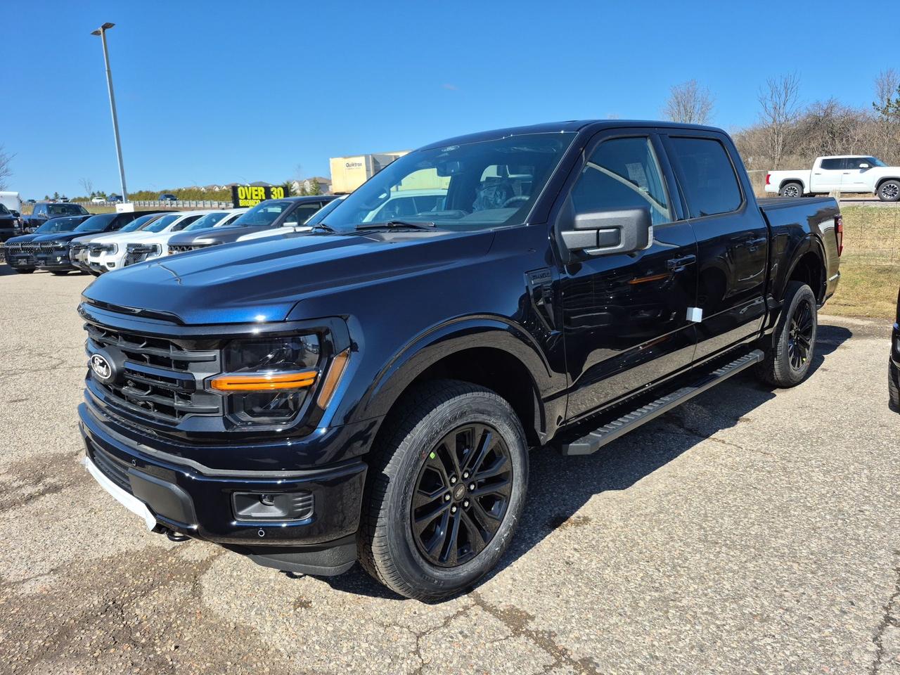 <p>Get ready to experience the future of capability and style with this brand-new 2026 Ford F-150 XLT from Expressway Motors Ltd.! This rugged yet refined truck is designed to conquer any terrain while providing a comfortable and connected driving experience. Finished in striking Antimatter Blue Metallic, this F-150 makes a bold statement wherever you go. Inside, youll find a sleek black interior, featuring unique sport cloth seating, offering both comfort and durability for those long drives.</p><p>Under the hood, this powerhouse boasts a robust 5L 8-cylinder engine, ready to deliver impressive performance and towing capacity. Paired with a smooth automatic transmission and 4-wheel drive, this truck is prepared to handle anything you throw its way, from daily commutes to weekend adventures. The inclusion of the XLT trim and Black Package adds a touch of sophistication, ensuring this truck stands out from the crowd.</p><p>Here are some of the standout features that make this F-150 an exceptional choice:</p><ul><li><strong>Antimatter Blue Metallic:</strong> Turn heads with a captivating exterior colour that reflects your bold personality.</li><li><strong>Spray-In Bed:</strong> Protect your truck bed with this durable, factory-installed feature, ready for any job.</li><li><strong>Adaptive Cruise Control:</strong> Enjoy a more relaxed and confident driving experience on the highway.</li><li><strong>4-Wheel Drive:</strong> Conquer any road conditions and take on challenging terrains with ease.</li><li><strong>5L 8-Cylinder Engine:</strong> Experience the raw power and exceptional performance you expect from a Ford F-150.</li></ul><p><strong><em>Powered by AutoIntelligence&trade;</em></strong> Vehicle information has been generated using artificial intelligence and is provided for informational purposes only. While efforts are made to ensure accuracy, please confirm all details directly with the dealer.</p><p class=MsoNormal style=margin: 0cm 0cm 8pt; line-height: 13.8pt; font-size: 12pt; font-family: Aptos, sans-serif;><strong><span style=font-family: Calibri, sans-serif;>2 locations to better serve YOU! &ndash; Stratford and New Hamburg</span></strong></p><p>&nbsp;</p><p class=MsoNormal style=margin: 0cm 0cm 8pt; line-height: 13.8pt; font-size: 12pt; font-family: Aptos, sans-serif;><strong><span style=font-family: Calibri, sans-serif;>New or Pre-Owned vehicles are shared between both locations &ndash; please contact Sales to confirm.</span></strong></p><p>&nbsp;</p><p class=MsoNormal style=margin: 0cm 0cm 8pt; line-height: 13.8pt; font-size: 12pt; font-family: Aptos, sans-serif;><span style=font-family: Calibri, sans-serif;>Purchasing a new vehicle from&nbsp;<strong>Expressway&nbsp;</strong>is a decision that you will be able to make with confidence knowing that you&rsquo;re getting the most that a vehicle and dealership can offer to you.</span></p><p>&nbsp;</p><p class=MsoNormal style=margin: 0cm 0cm 8pt; line-height: 13.8pt; font-size: 12pt; font-family: Aptos, sans-serif;><strong><span style=font-family: Calibri, sans-serif;>Warranty:</span></strong><span style=font-family: Calibri, sans-serif;>&nbsp;We offer best in class Extended Protection options with flexible terms that can be tailored to your needs at a price that you can afford.</span></p><p>&nbsp;</p><p class=MsoNormal style=margin: 0cm 0cm 8pt; line-height: 13.8pt; font-size: 12pt; font-family: Aptos, sans-serif;><strong><span style=font-family: Calibri, sans-serif;>Finance:</span></strong><span style=font-family: Calibri, sans-serif;>&nbsp;At Expressway we have some of the best Finance Managers in the business that work with all the Major banks and Core Lenders. The Relationships we have built will help guarantee that you get the lowest rate possible</span></p><p>&nbsp;</p><p class=MsoNormal style=margin: 0cm 0cm 8pt; line-height: 13.8pt; font-size: 12pt; font-family: Aptos, sans-serif;><span style=font-family: Calibri, sans-serif;>Check out our great selection of vehicles at Expressway in New Hamburg and Stratford Locations!</span></p><p>&nbsp;</p><p class=MsoNormal style=margin: 0cm 0cm 8pt; line-height: 13.8pt; font-size: 12pt; font-family: Aptos, sans-serif;><strong><span style=font-family: Calibri, sans-serif;>Call Expressway for your quote today!</span></strong></p><p>&nbsp;</p><p class=MsoNormal style=margin: 0cm 0cm 8pt; line-height: 13.8pt; font-size: 12pt; font-family: Aptos, sans-serif;><strong><span style=font-family: Calibri, sans-serif;>New Hamburg:</span></strong><span style=font-family: Calibri, sans-serif;>&nbsp;<a href=tel:+15196623900><span style=color: #0563c1;>519*662*3900</span></a></span></p><p>&nbsp;</p><p class=MsoNormal style=margin: 0cm 0cm 8pt; line-height: 13.8pt; font-size: 12pt; font-family: Aptos, sans-serif;><strong><span style=font-family: Calibri, sans-serif;>Stratford</span></strong><span style=font-family: Calibri, sans-serif;>:&nbsp;<a href=tel:+15192713900><span style=color: #0563c1;>519*271*3900</span></a></span></p><p>&nbsp;</p><p class=MsoNormal style=margin: 0cm 0cm 8pt; line-height: 13.8pt; font-size: 12pt; font-family: Aptos, sans-serif;><span style=font-family: Calibri, sans-serif;>or visit us online at:&nbsp;&nbsp;<a href=https://www.expresswayford.com/ target=_blank rel=noopener><span style=color: #0563c1;>www. expresswayford .com</span></a>&nbsp;or&nbsp;<a href=https://www.expresswaylincoln.ca/ target=_blank rel=noopener><span style=color: #0563c1;>www. expresswaylincoln .ca</span></a></span></p><p>&nbsp;</p><p class=MsoNormal style=margin: 0cm 0cm 8pt; line-height: 13.8pt; font-size: 12pt; font-family: Aptos, sans-serif;><strong><span style=font-family: Calibri, sans-serif;>We pride ourselves in No Hassle, No Pressure, Honest Service. We practice full disclosure with all our used vehicles and have a Better Business Bureau A+ rating!</span></strong></p><p>&nbsp;</p><p class=MsoNormal style=margin: 0cm 0cm 8pt; line-height: 13.8pt; font-size: 12pt; font-family: Aptos, sans-serif;><span style=font-size: 8pt; font-family: Calibri, sans-serif;>**Expressway reserves the right to correct any errors and omissions that occur on this site. (Incl, but not limited to price, incl. Event price rollbacks, vehicles features & more).</span></p><p>&nbsp;</p><p class=MsoNormal style=margin: 0cm 0cm 8pt; line-height: 13.8pt; font-size: 12pt; font-family: Aptos, sans-serif;><span style=font-size: 8pt; font-family: Calibri, sans-serif;>** Expressway is a Fair Market Price Dealership pricing subject to change with current market conditions</span></p>